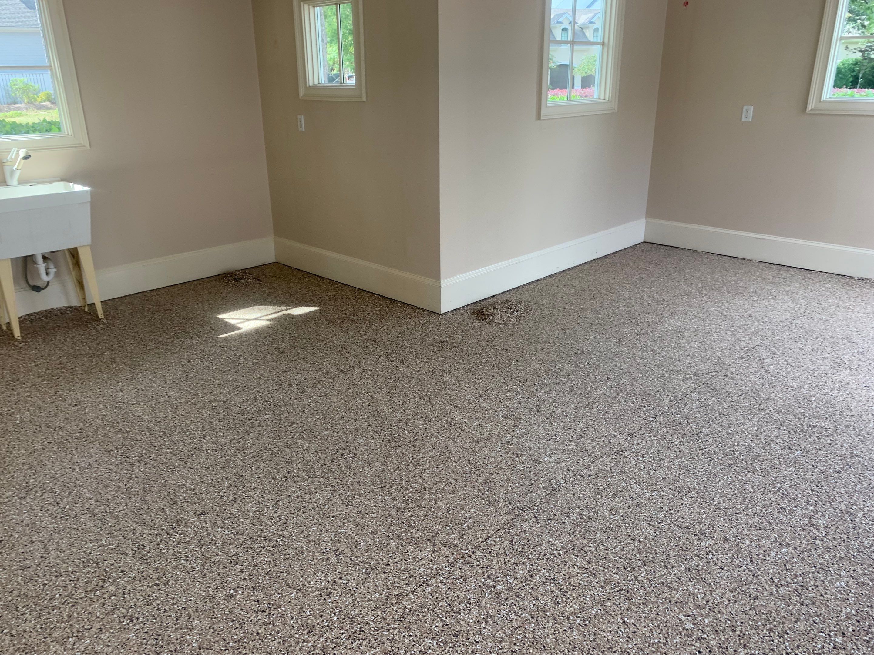Garage TransFLOORmation using Sandstone by Innovative Concrete Coatings 