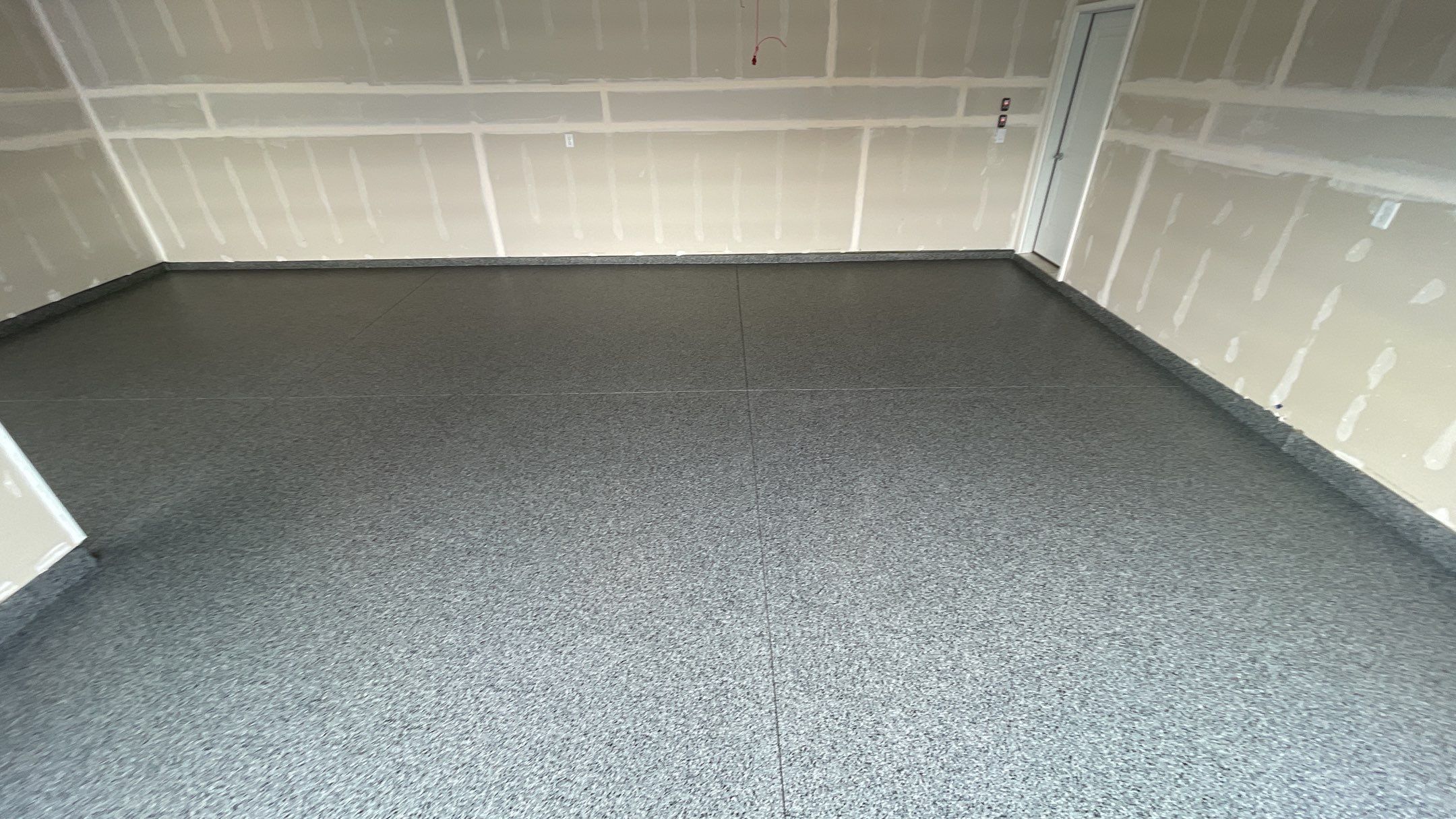 Garage Transformation using Nightfall by Croc Coatings, LLC
