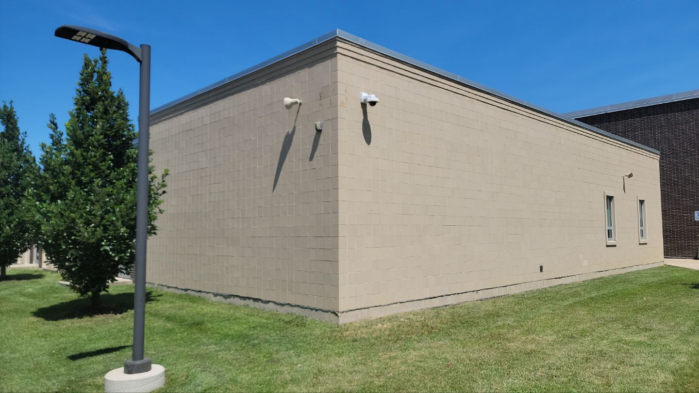commercial pressure washing using Algaecide, soft wash soap by Northern Power Washing LLC.