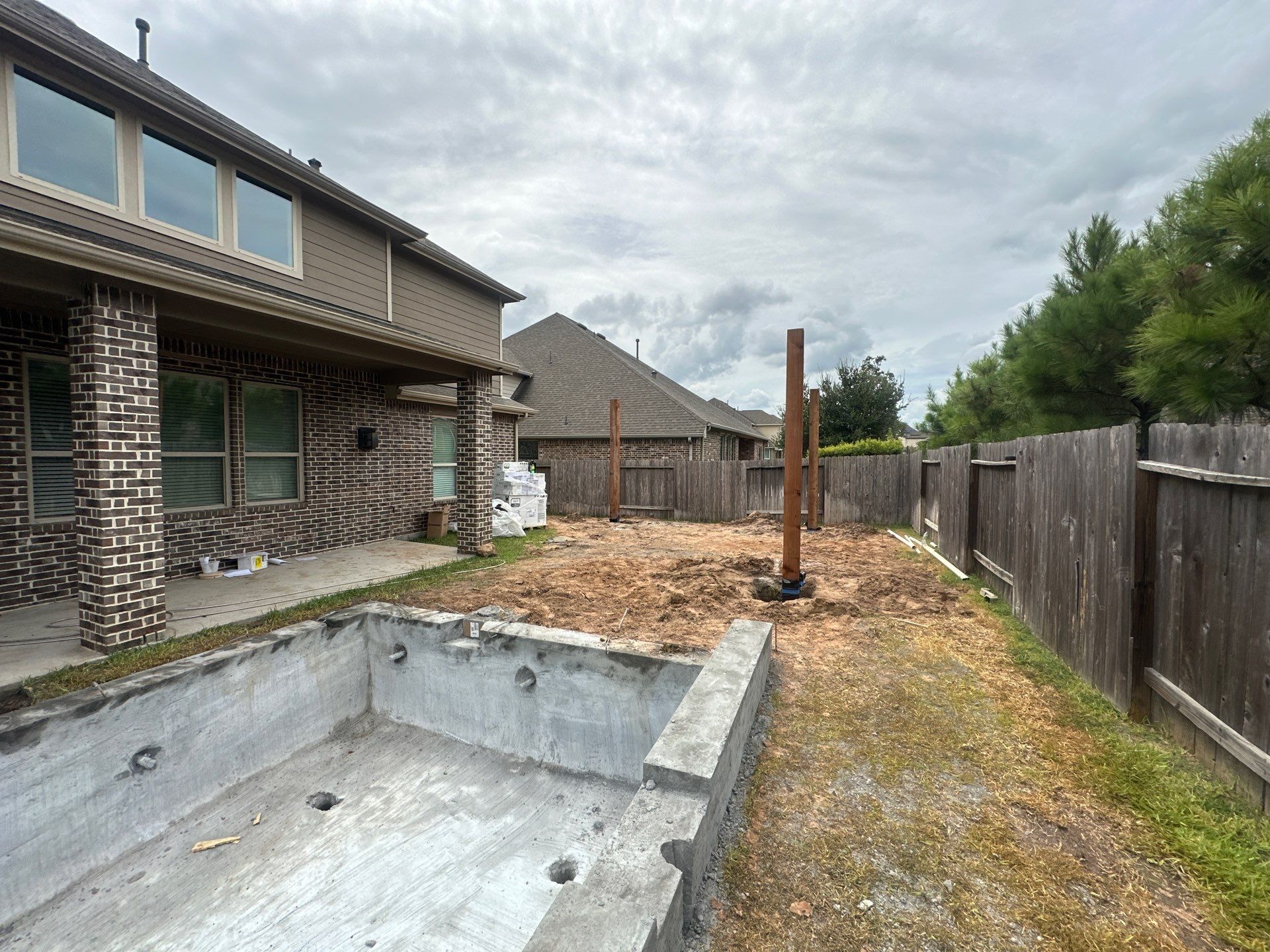 Covered Patio and Summer Kitchen in Spring,  TX by SophAlx LLC