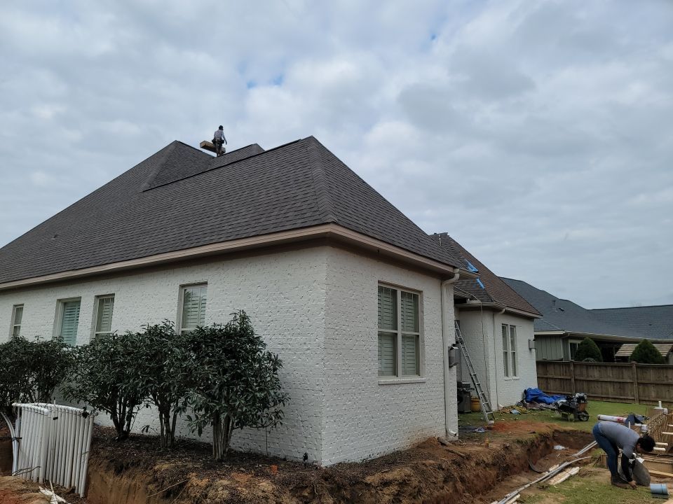 Residential Roofing Installation using Roof Replacement by American Roofing & Construction LLC