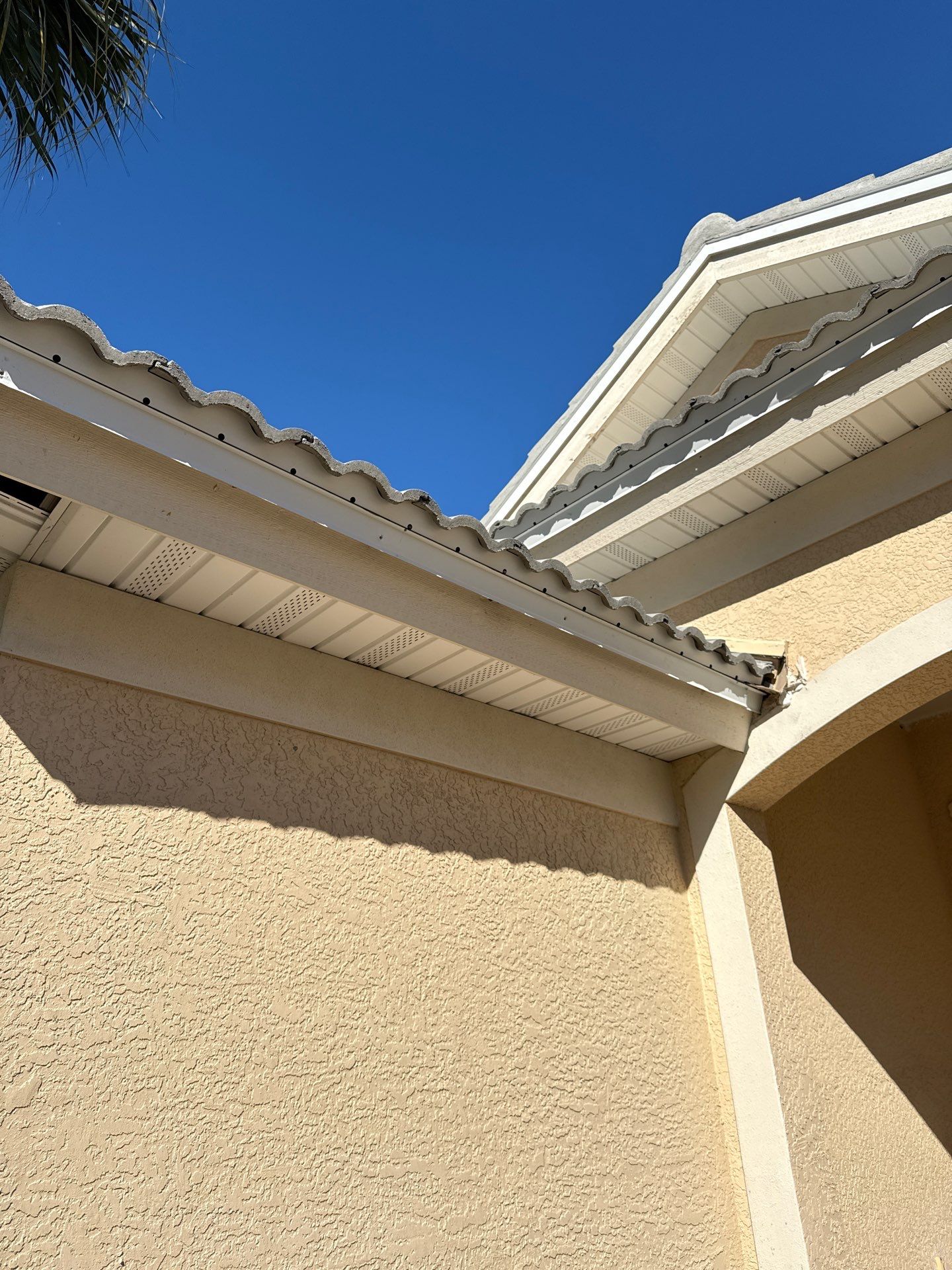 6-inch K-style Seamless Gutters and Splash Guard in Grey Color in Naples FL by Gutter Professors