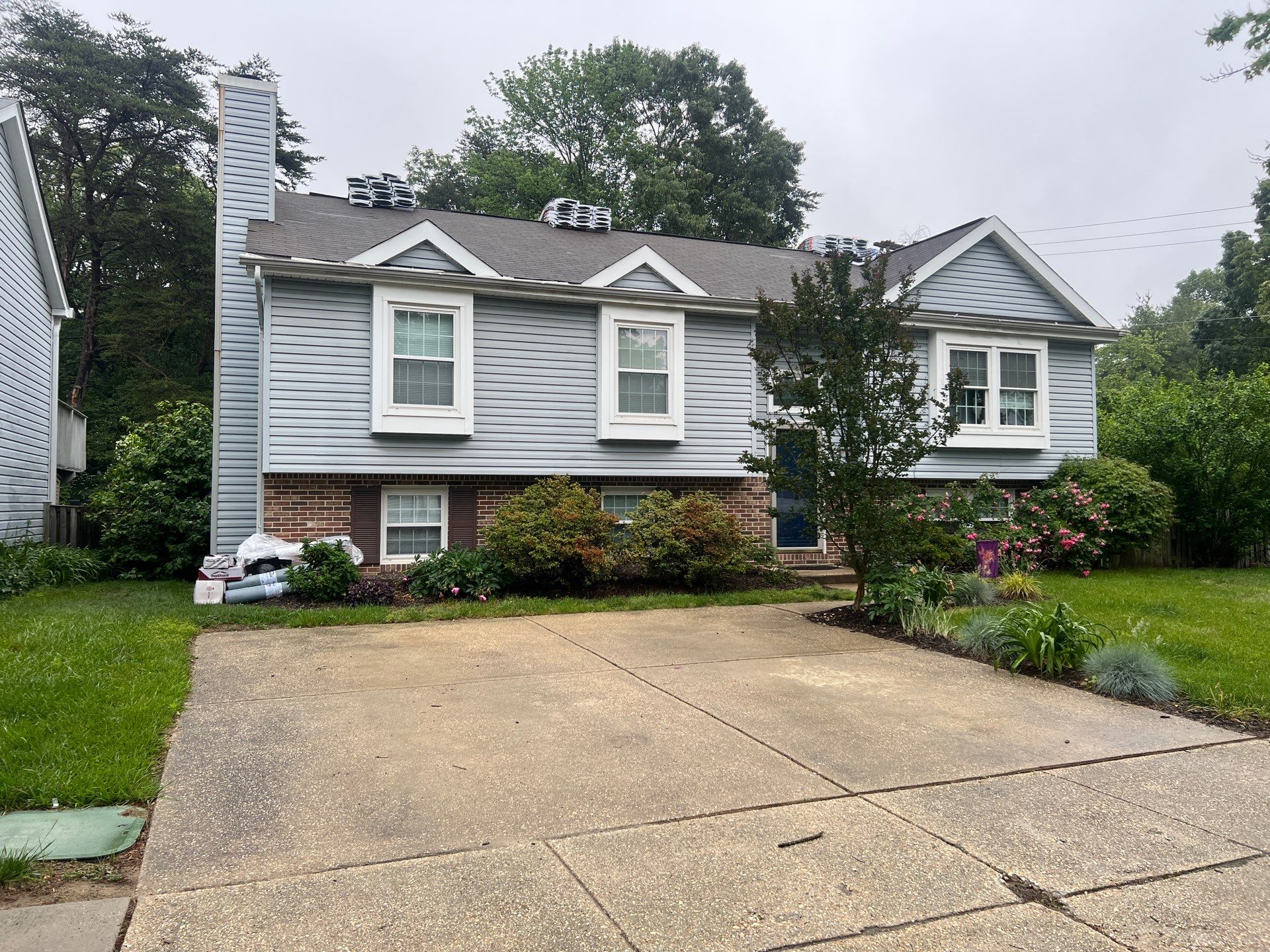 Re-Roof in Pasadena  by Potomac Custom Remodeling 