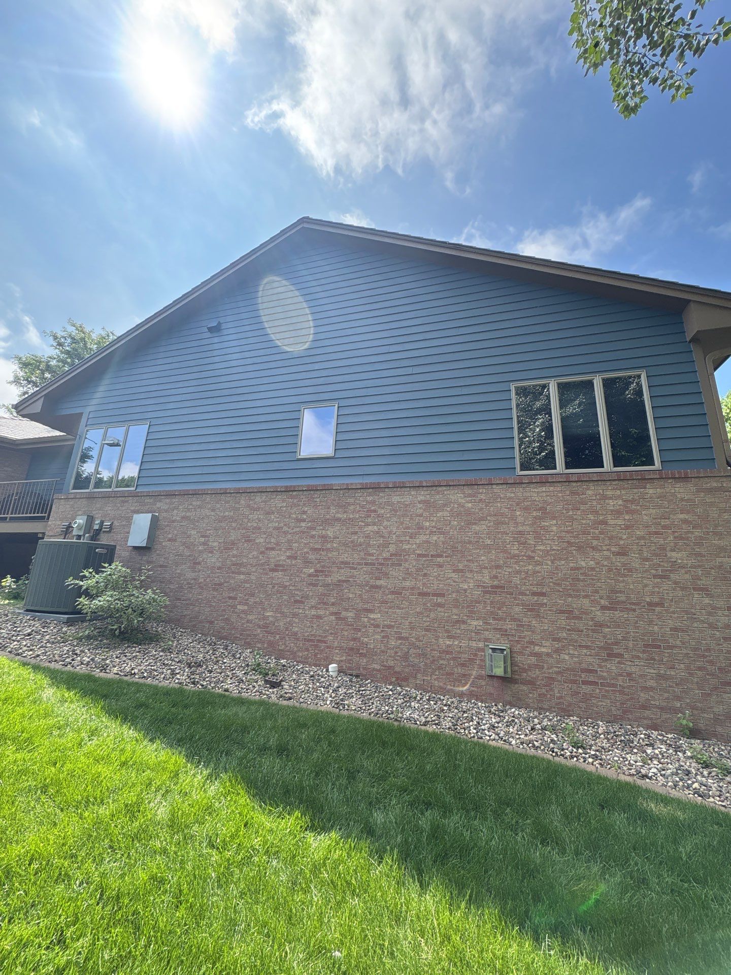 Residential Exterior Painting and Siding Refresh in Sioux Falls by Select Painting, Coatings & Garage Cabinets
