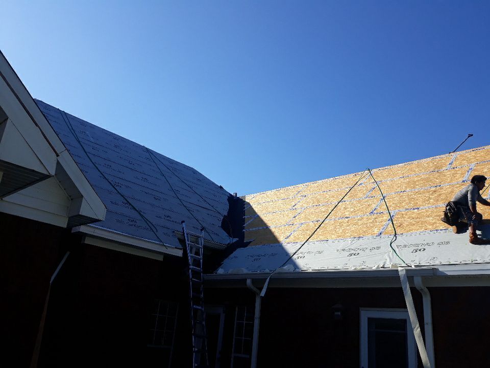 Residential Roofing Installation using Roof Replacement by American Roofing & Construction LLC