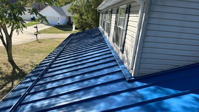 Residential Roofing Installation using Standing Seam Metal - Gallary Blue