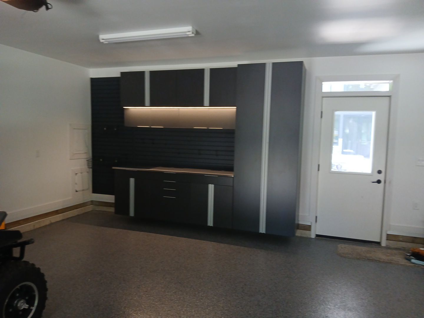 Garage Man Cave in Sawyer Michigan by Innovative Spaces / Innovative Concrete Coatings