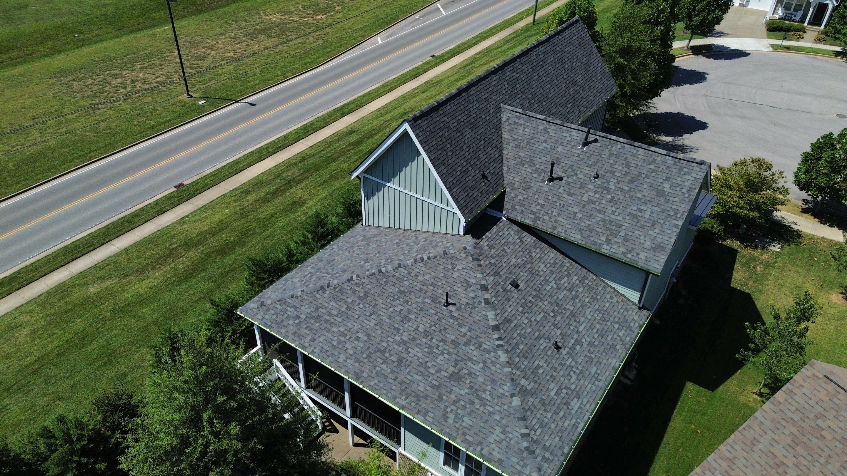 Residential Roof Replacement and Bronze Gutter Installation in Franklin by Shinglesmiths Roofing