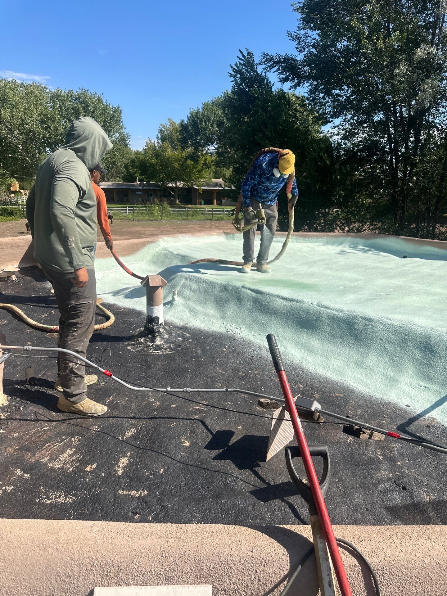Residential roof application by SPF Services 