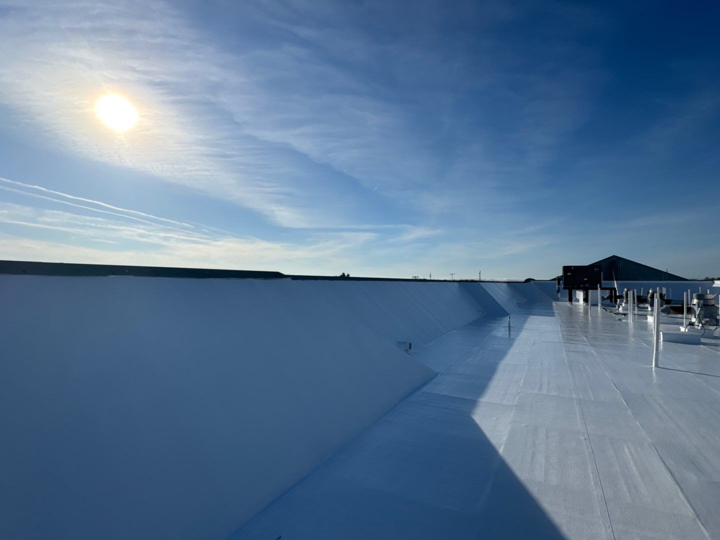 Commercial White Silicone Roof Coating for Hotel in Oldsmar by CES Roofing