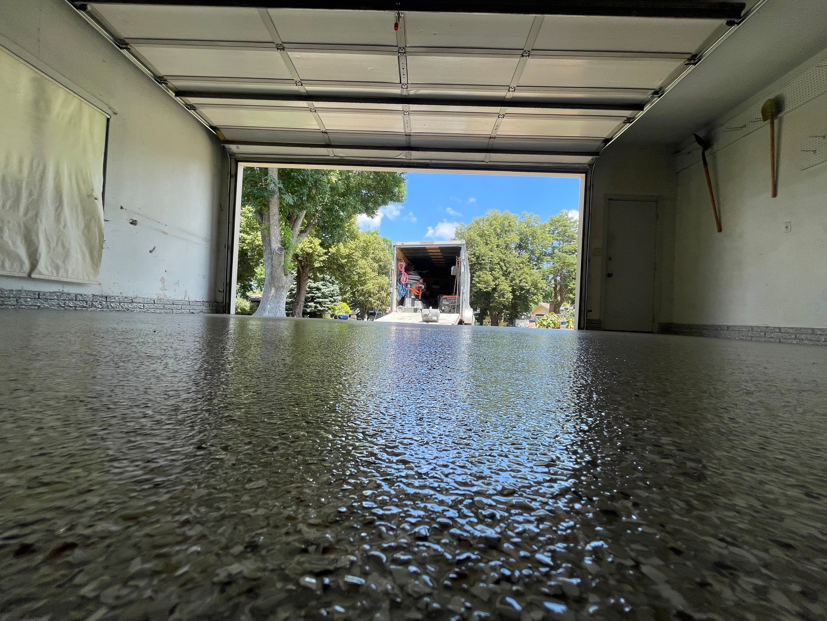 Custom Creekbed Garage Floor Coating in Sioux Falls by Select Painting, Coatings & Garage Cabinets