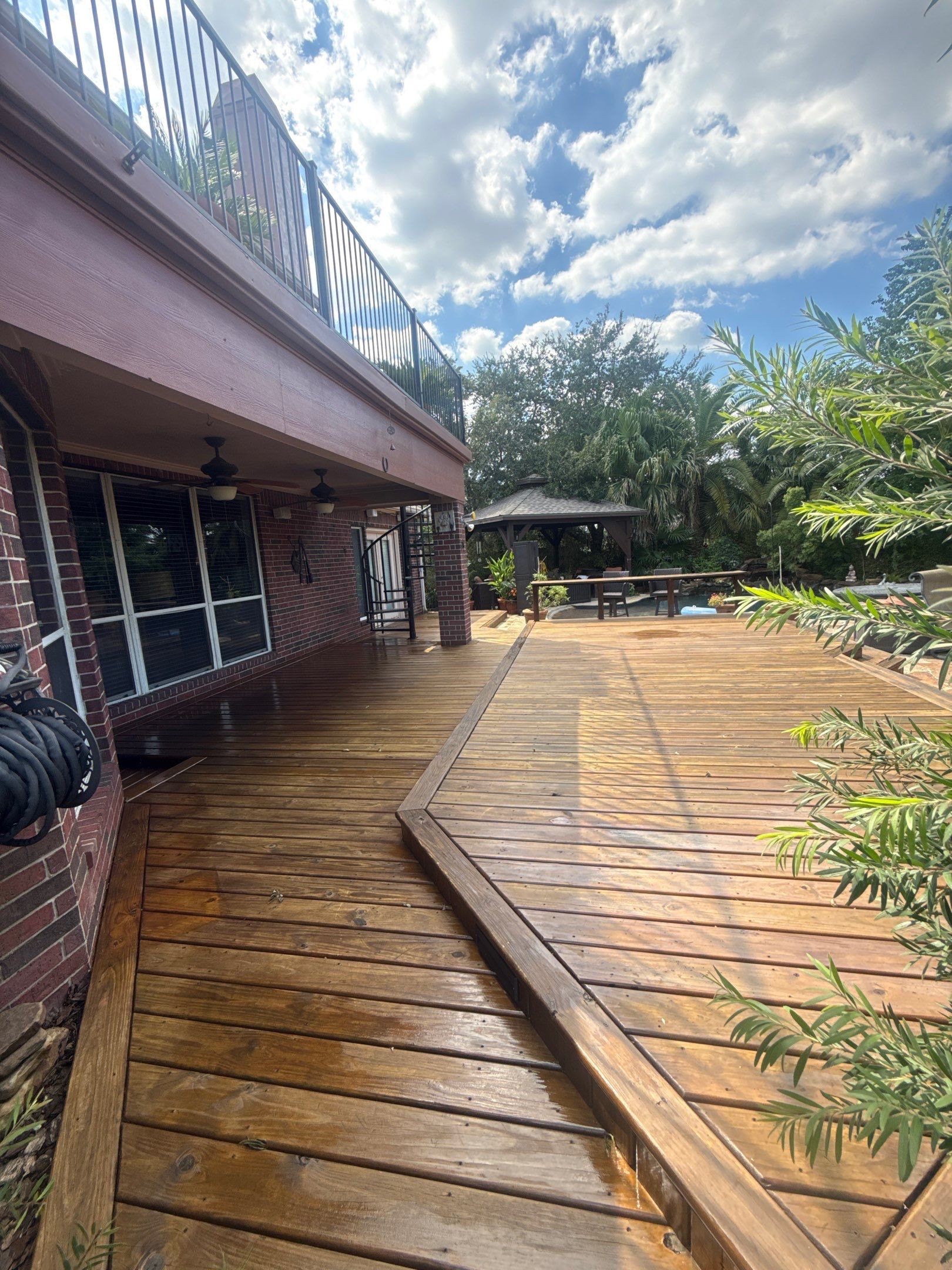 Multi-Level Wood Deck Restoration and Protective Staining in Pearland by Zeal Power Washing
