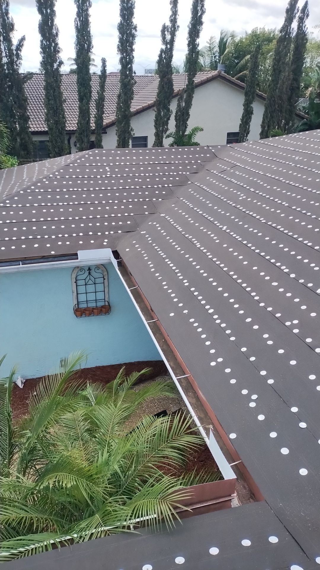 Residential Roofing Installation using 1" Nail strip metal roof by BLUES BROTHERS ROOFING