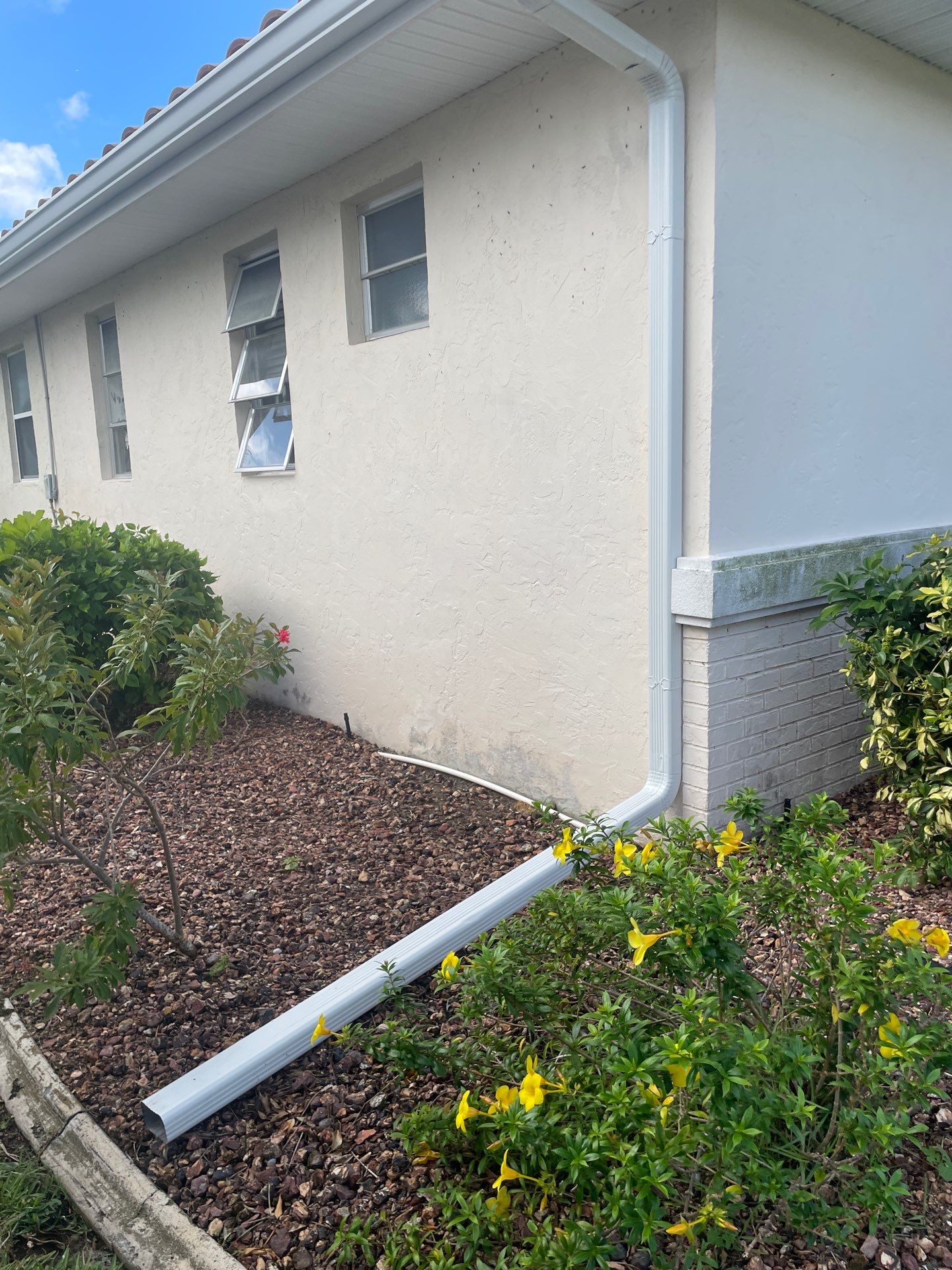 Connect Downspouts to Drain in Punta Gorda FL by Gutter Professors