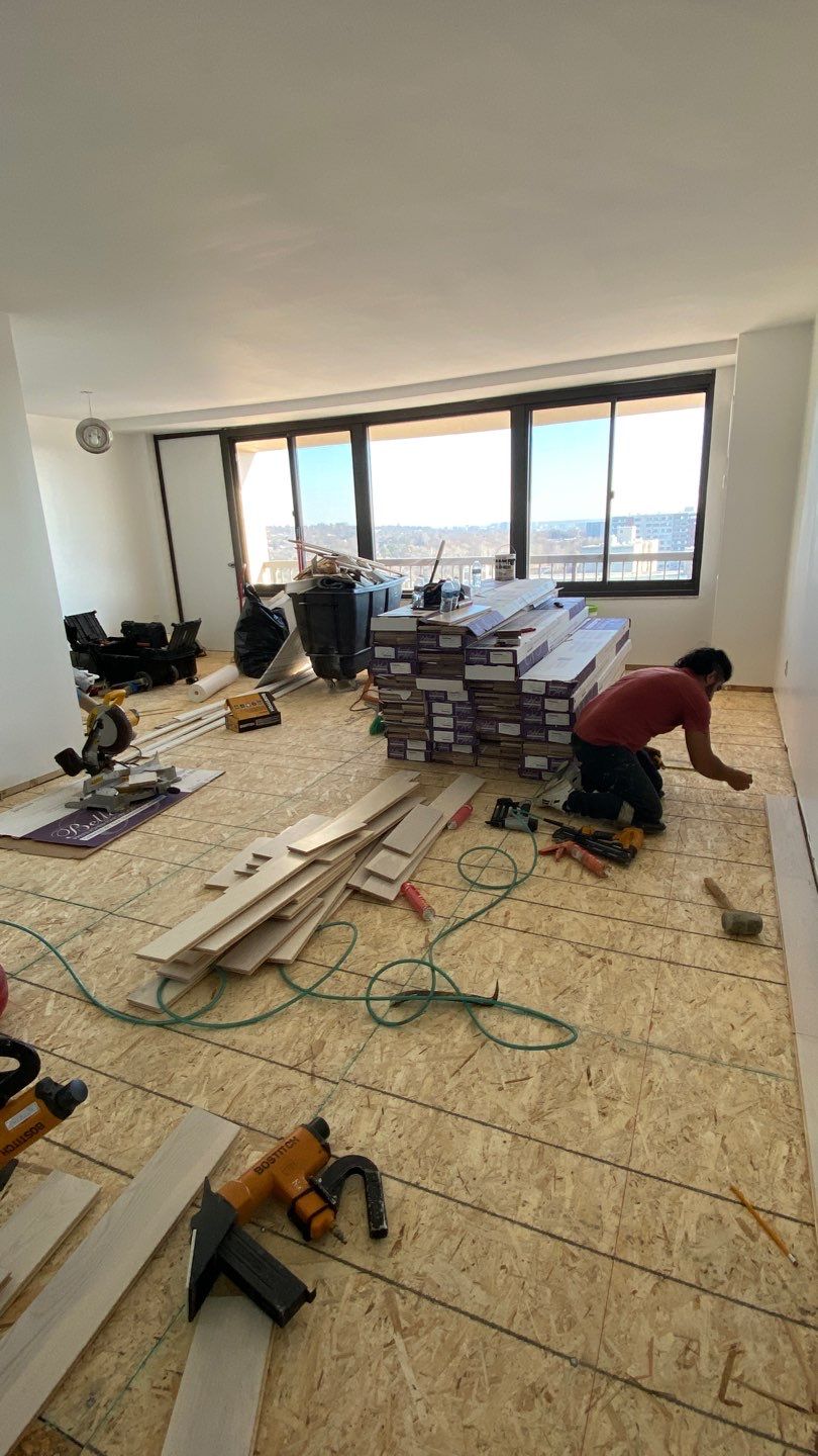 Apartament renovation  using Harwood floor  by Jesus Master Handyman LLC 