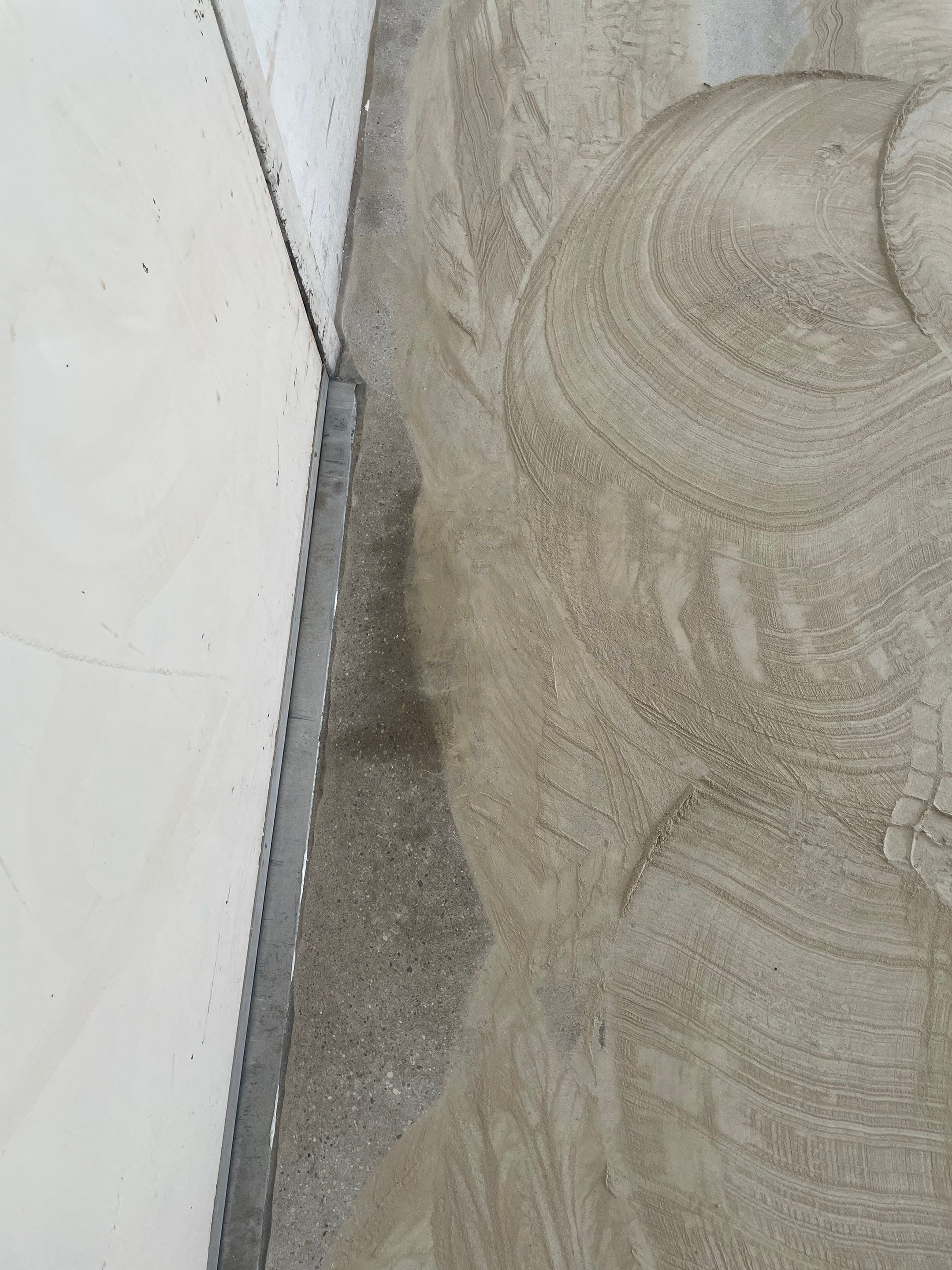 Coyote Flake Concrete Coating for Sioux Falls Garage by Select Painting, Coatings & Garage Cabinets