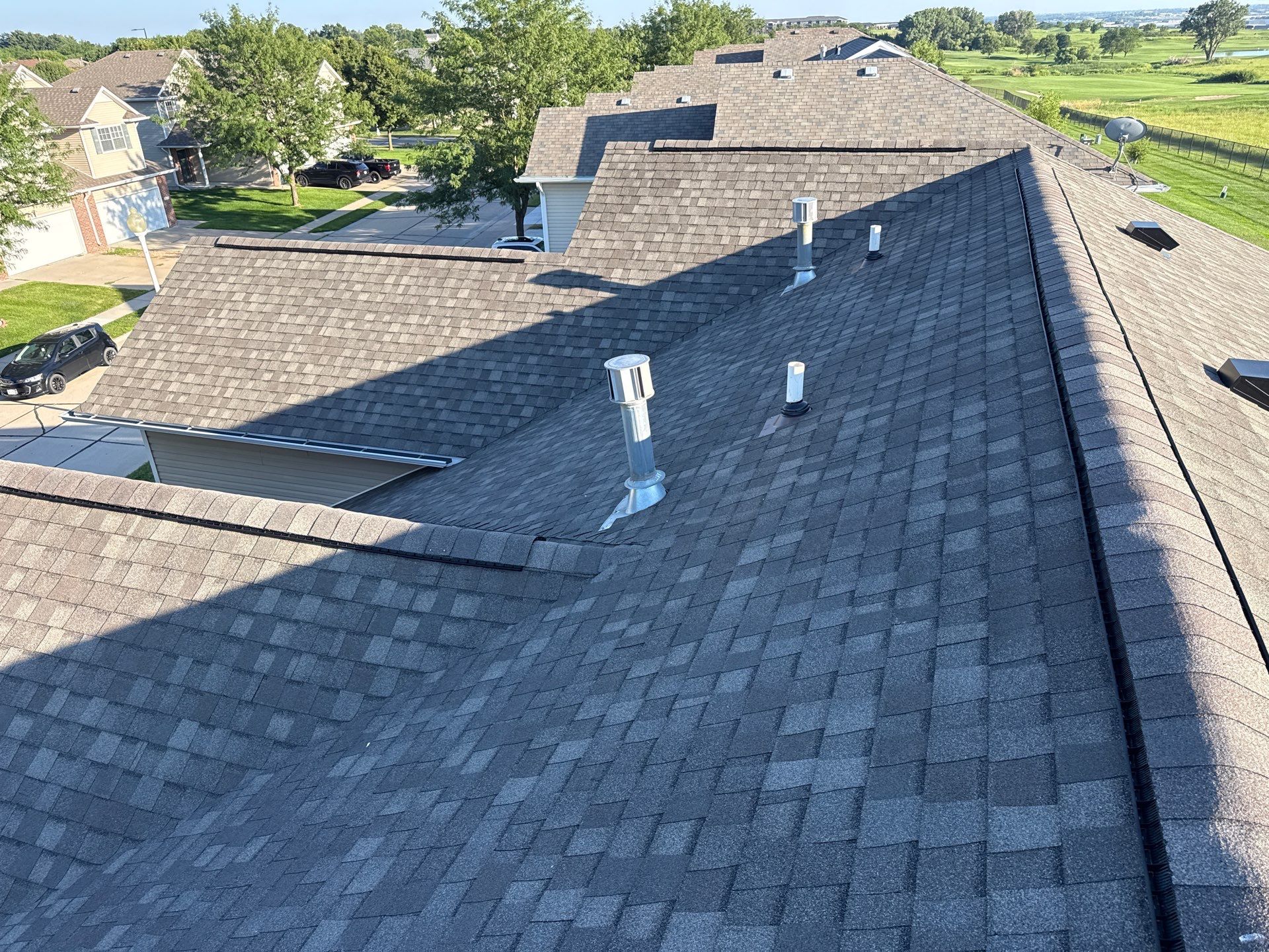 Residential Architectural Shingle Roof Replacement and Gutter Upgrade in Lincoln by Star Home