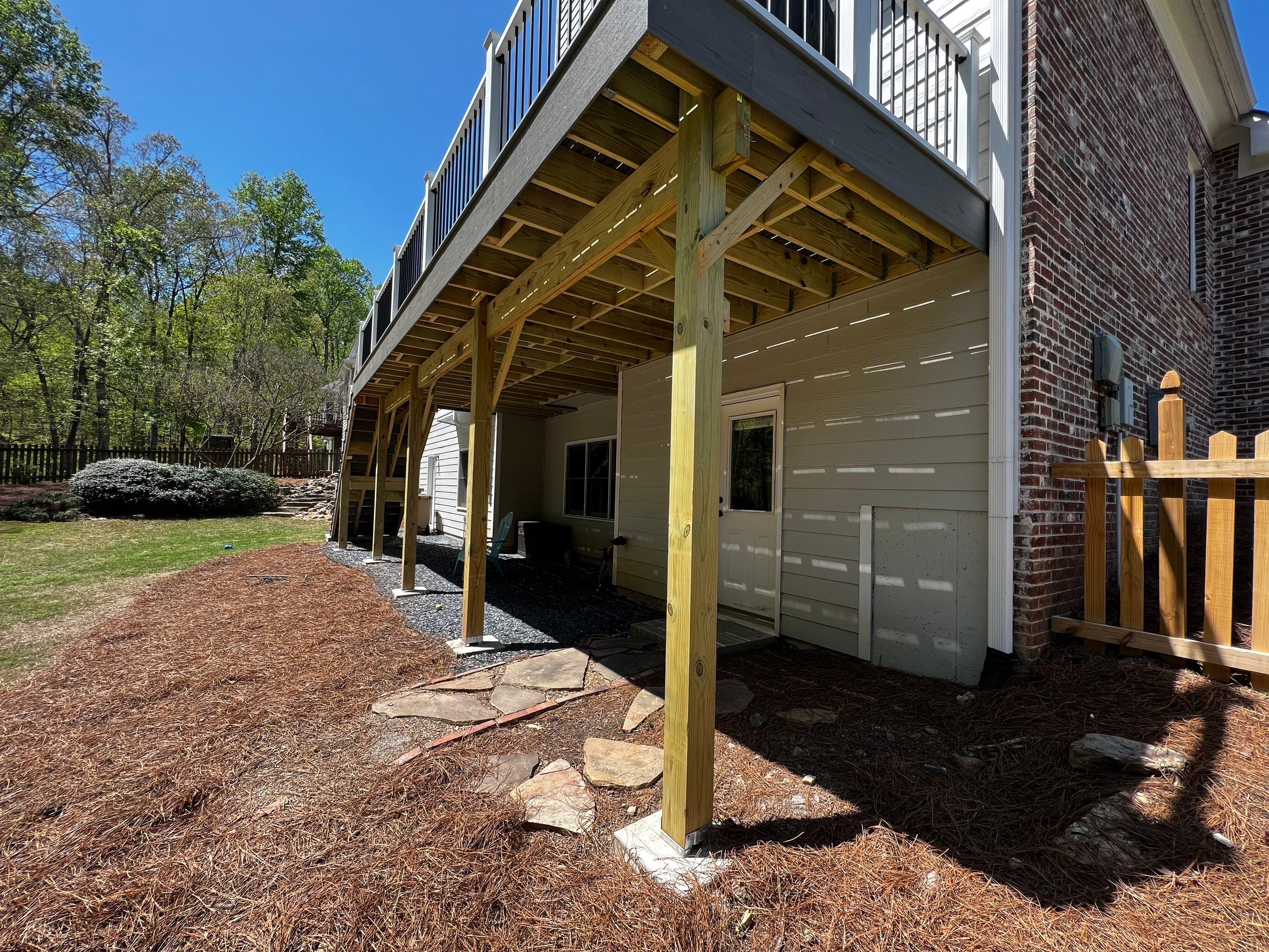 Elevated Grey Composite Deck Installation in Woodstock by Swift Home Renovations 