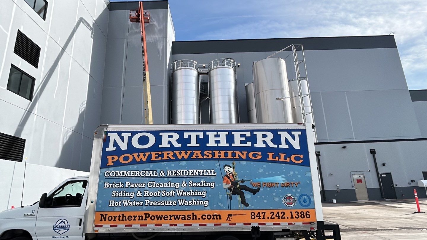 Oil removal using hot water and environmentally friendly degreaser by Northern Power Washing LLC.