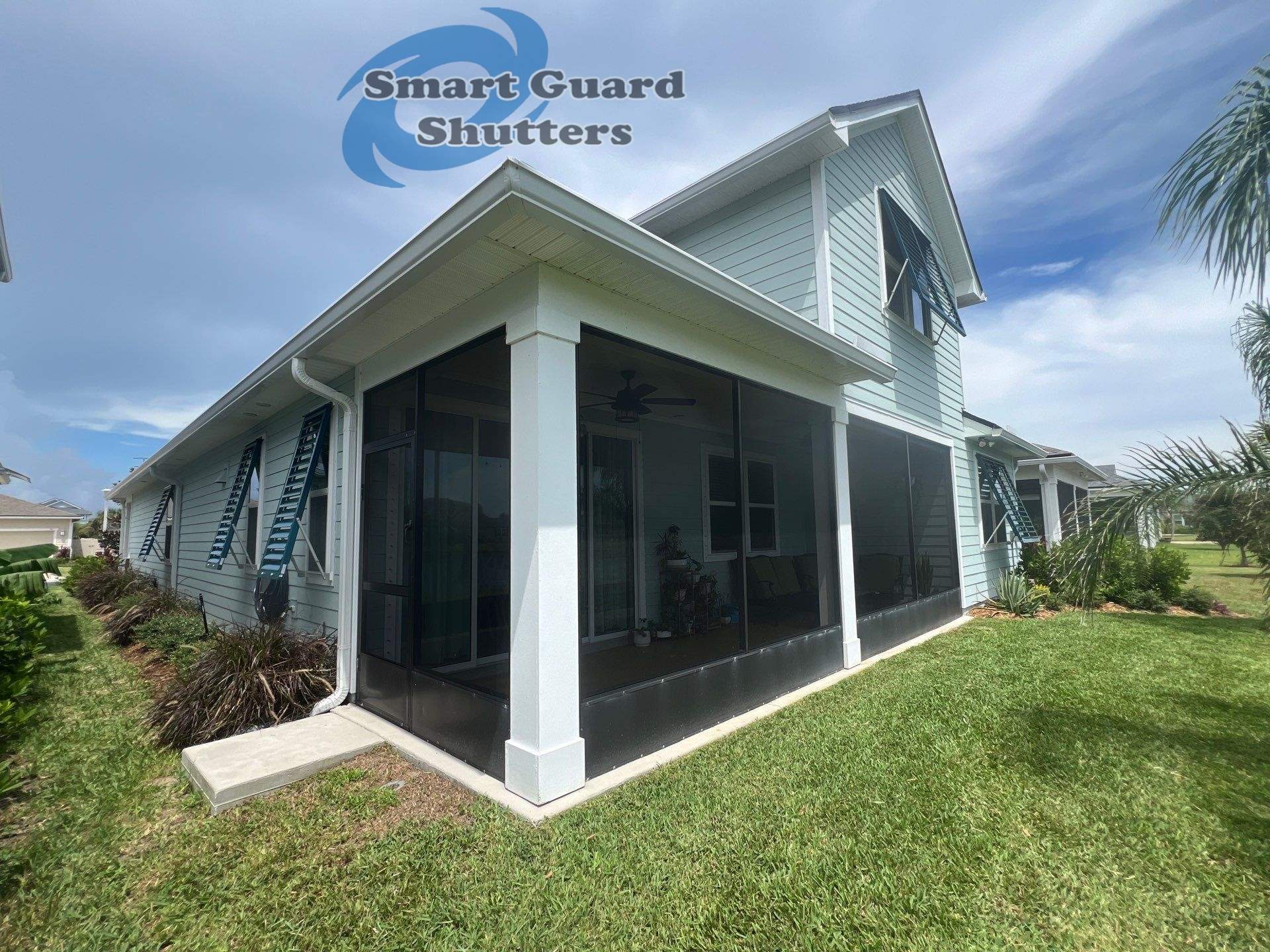 Impact Bahama Shutters in Ocean Blue by Smart Guard Shutters
