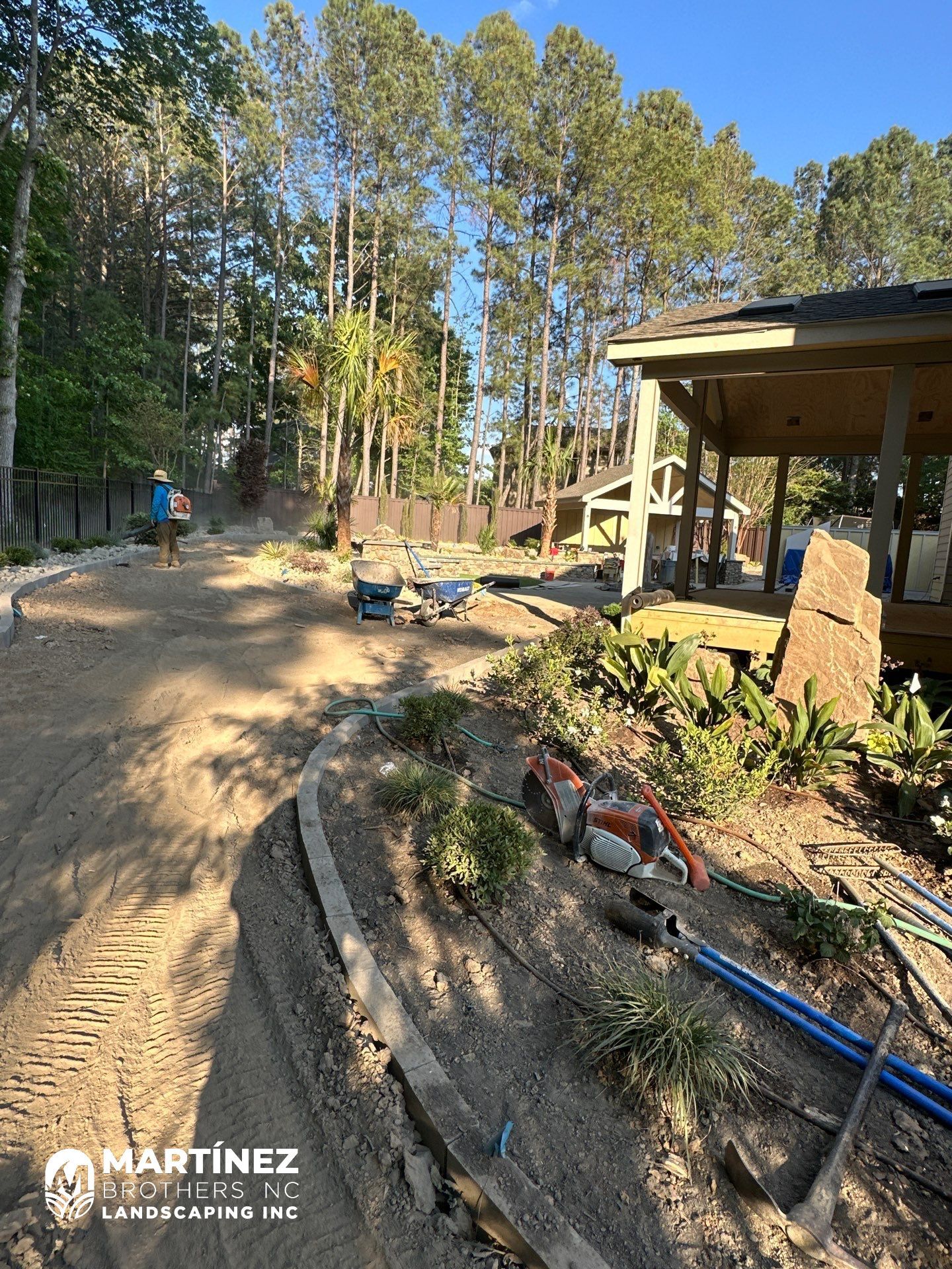 Backyard oasis in Cary by Martinez Brother’s Nc Landscaping Inc