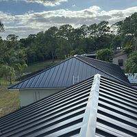 24ga 1.5" Mechanical Seam Dark Bronze by Total Roofing System The Metal Roof Experts