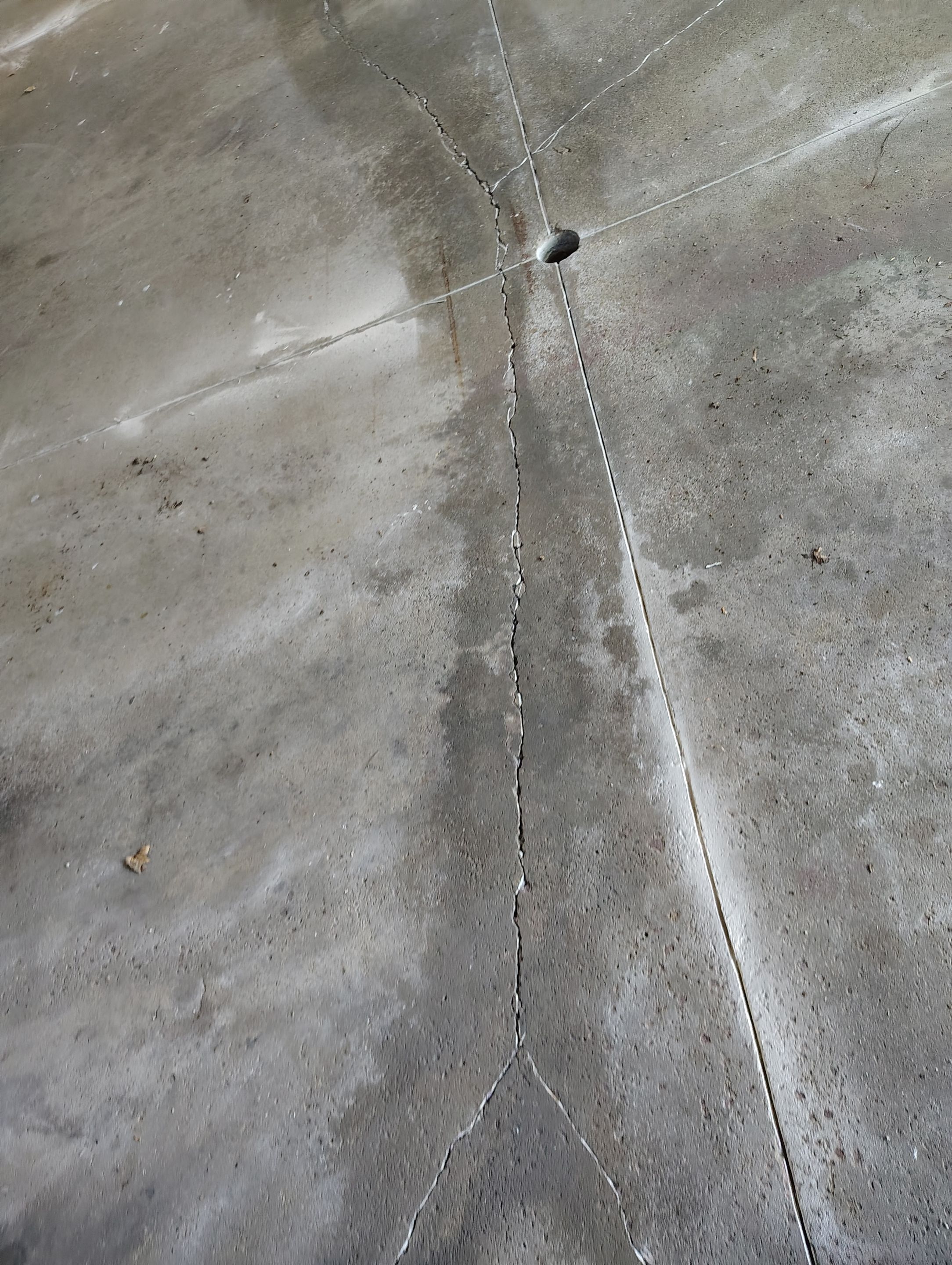 Sioux Falls Garage Concrete Repair and Epoxy Flake Floor Coating by Select Painting, Coatings & Garage Cabinets