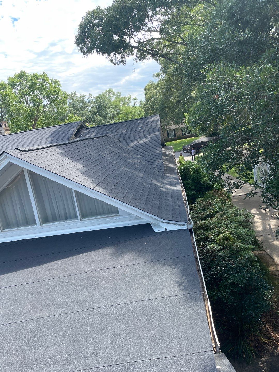 Residential Roofing Installation using Roof Replacement by American Roofing & Construction LLC