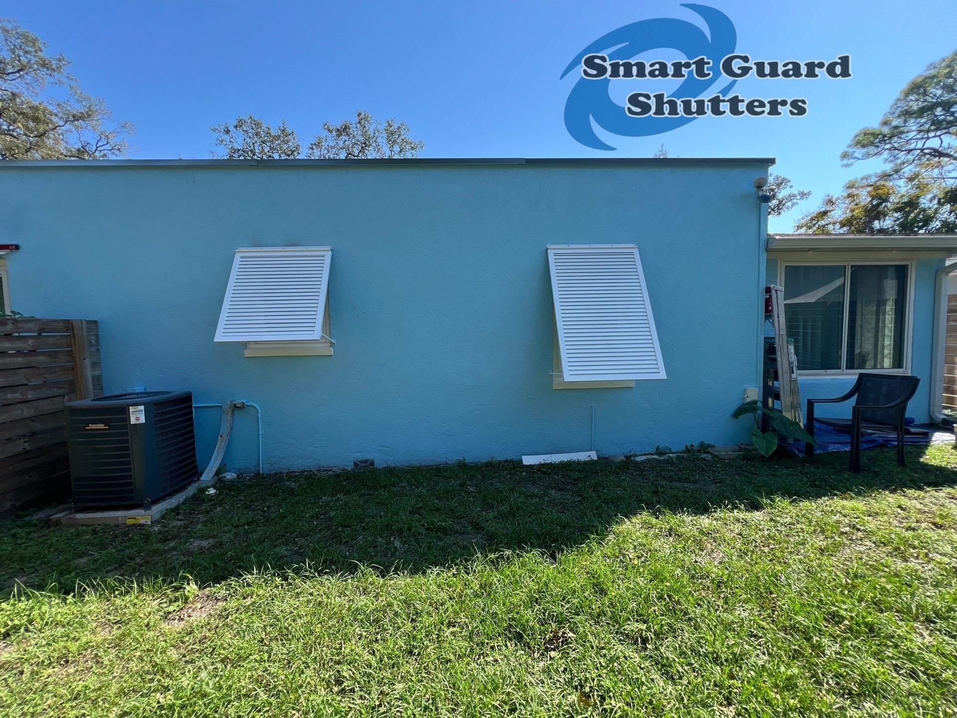 Decorative Bahama Shutters in Signal White  by Smart Guard Shutters