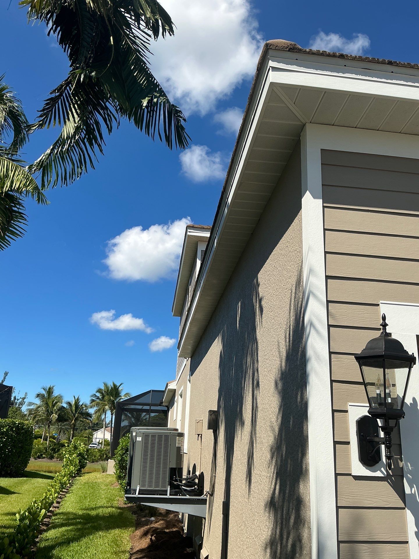 Bronze Downspouts & 7-Inch K-style Seamless Gutter Installation in Fort Myers FL by Gutter Professors