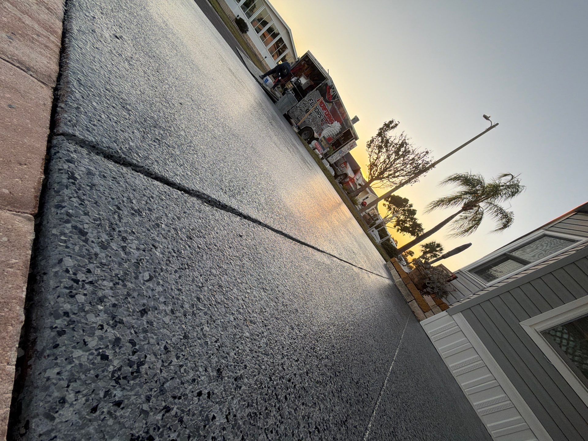 Driveway Transformation: Nightfall Flake System with Full UV & Moisture Protection by Performance Floors & Coating