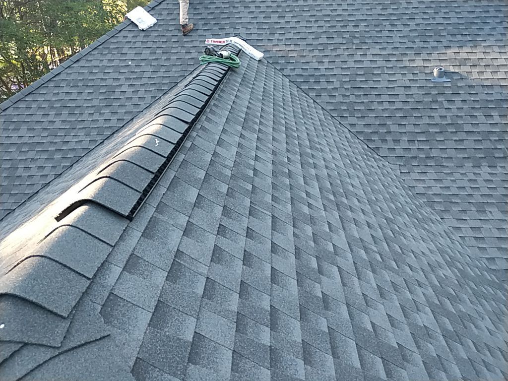 Residential Roofing Installation using Roof Replacement by American Roofing & Construction LLC