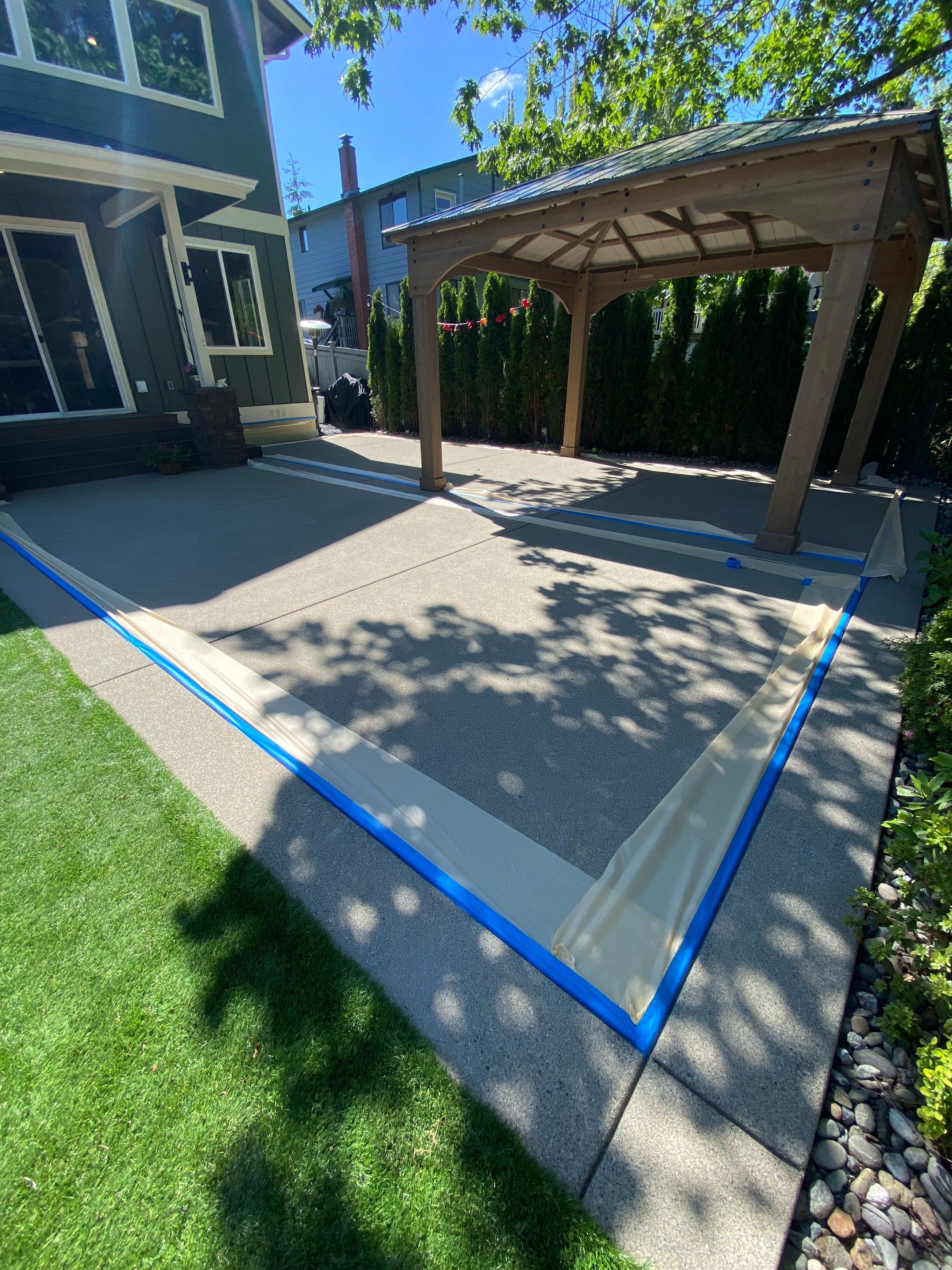 Patio Installation using Concrete, Retaining walls, and Turf install by Jireh Asphalt & Concrete Inc 