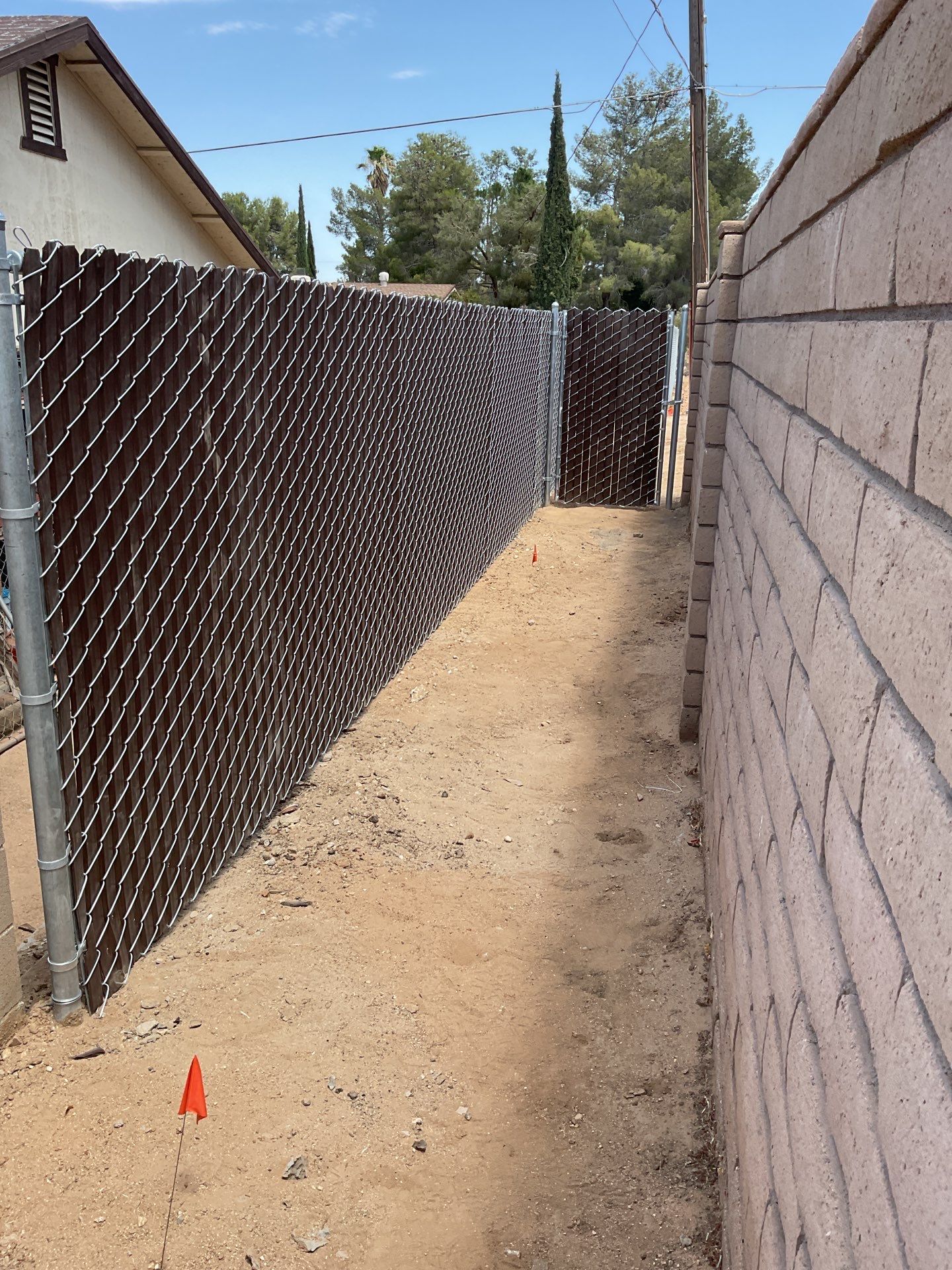 Dark Brown Privacy Chain Link Fence by Fence Guys Inc.