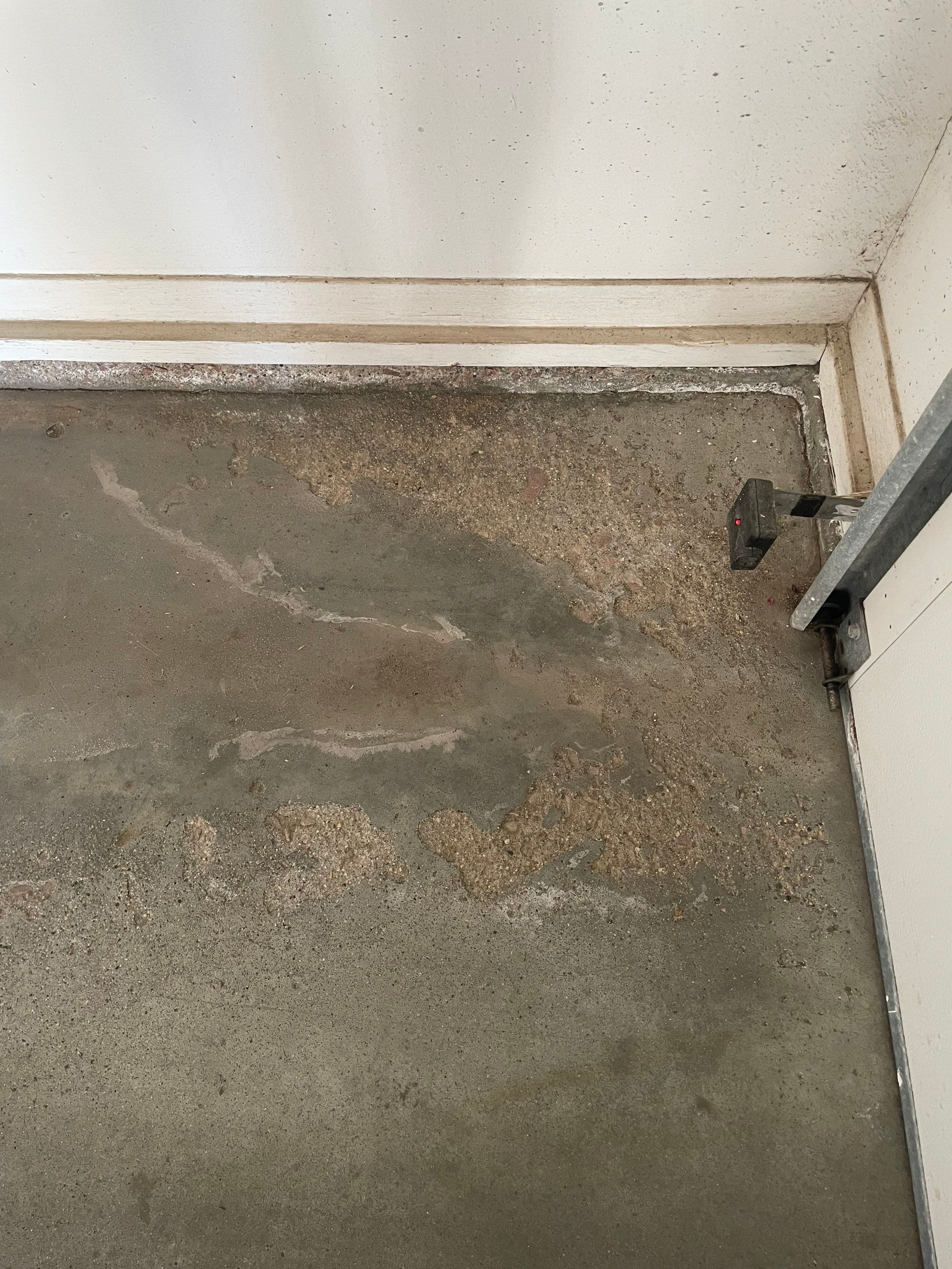 Yankton Garage Floor Restoration with Gray Speckled Epoxy Coating by Select Painting, Coatings & Garage Cabinets