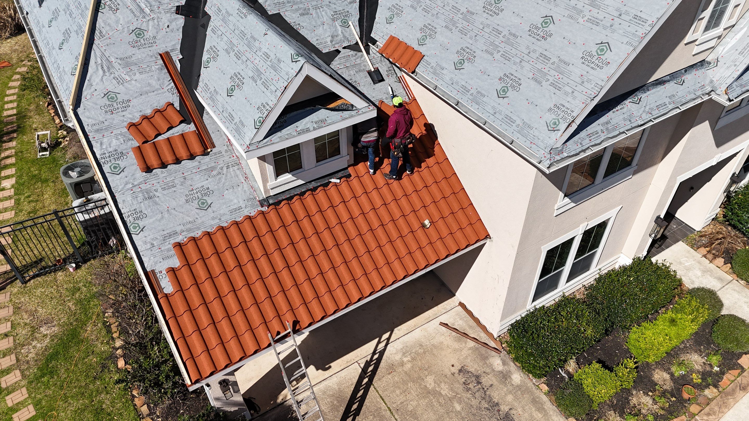 Stunning transformation using DECRA Villa Tile!  by Core Four Roofing
