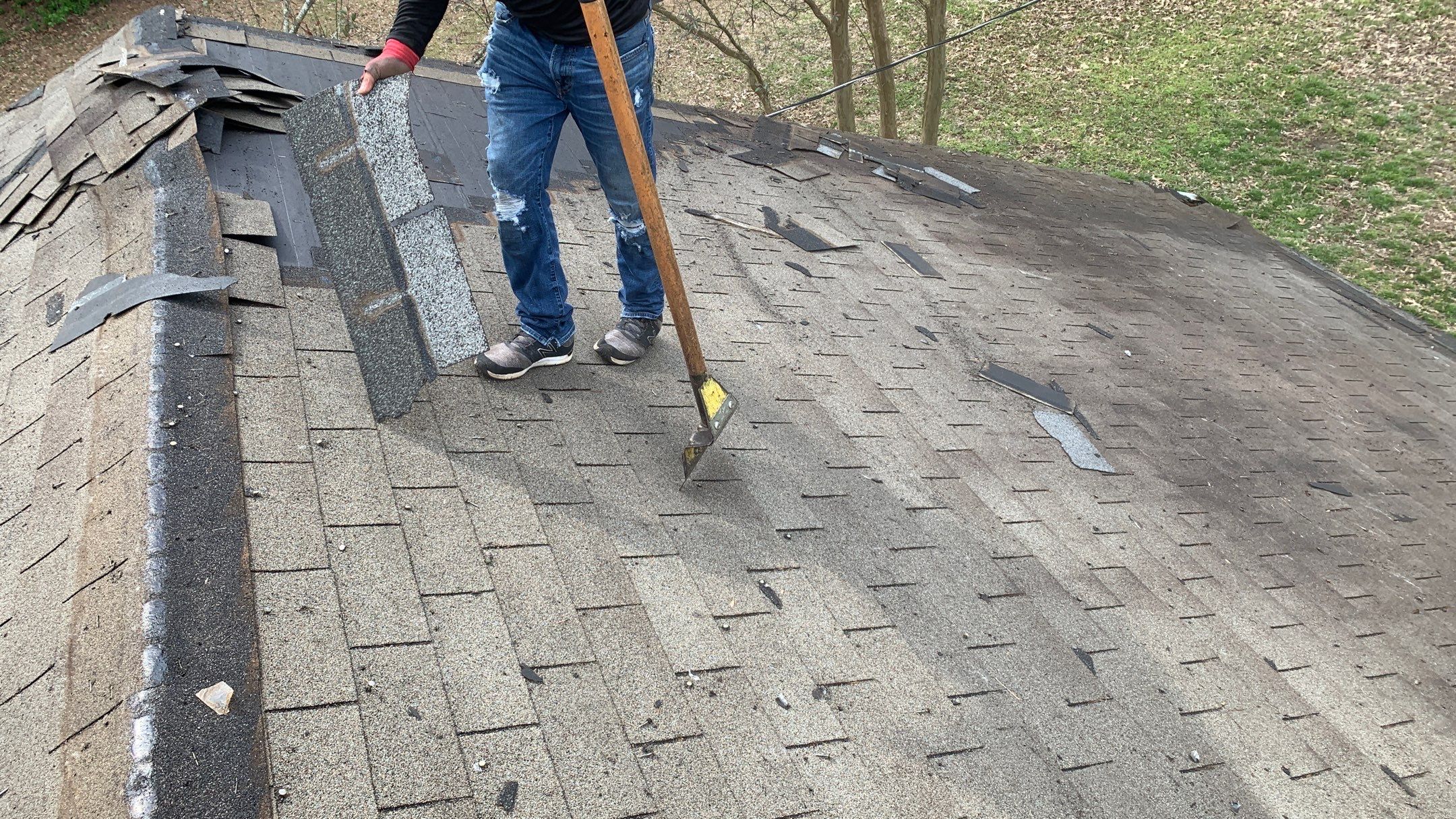 Residential Roofing Installation using 26 Gauge Colored Panels by Hostetler Roofing