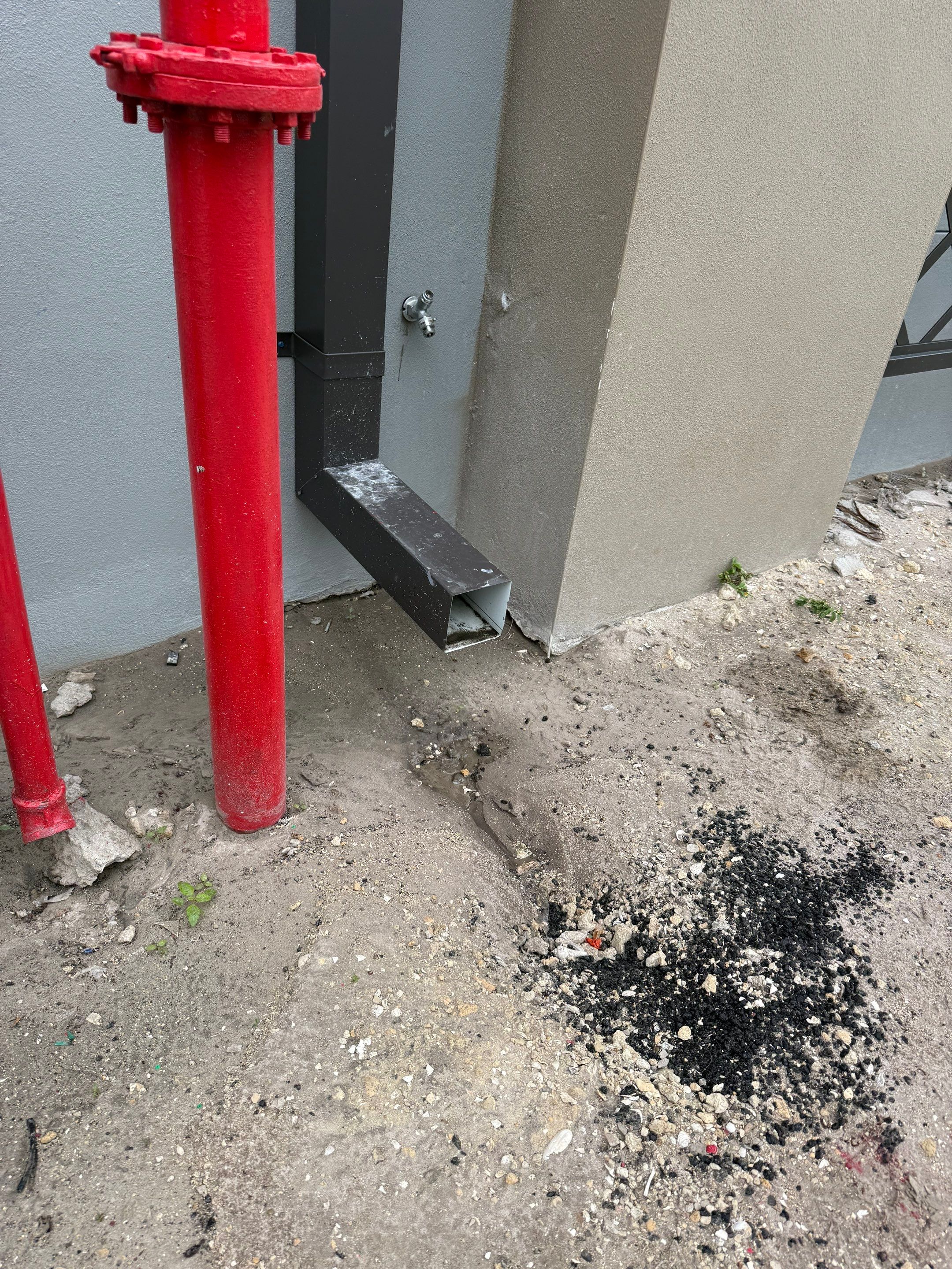 Downspout Installation using collector head in Cape Coral FL by Gutter Professors