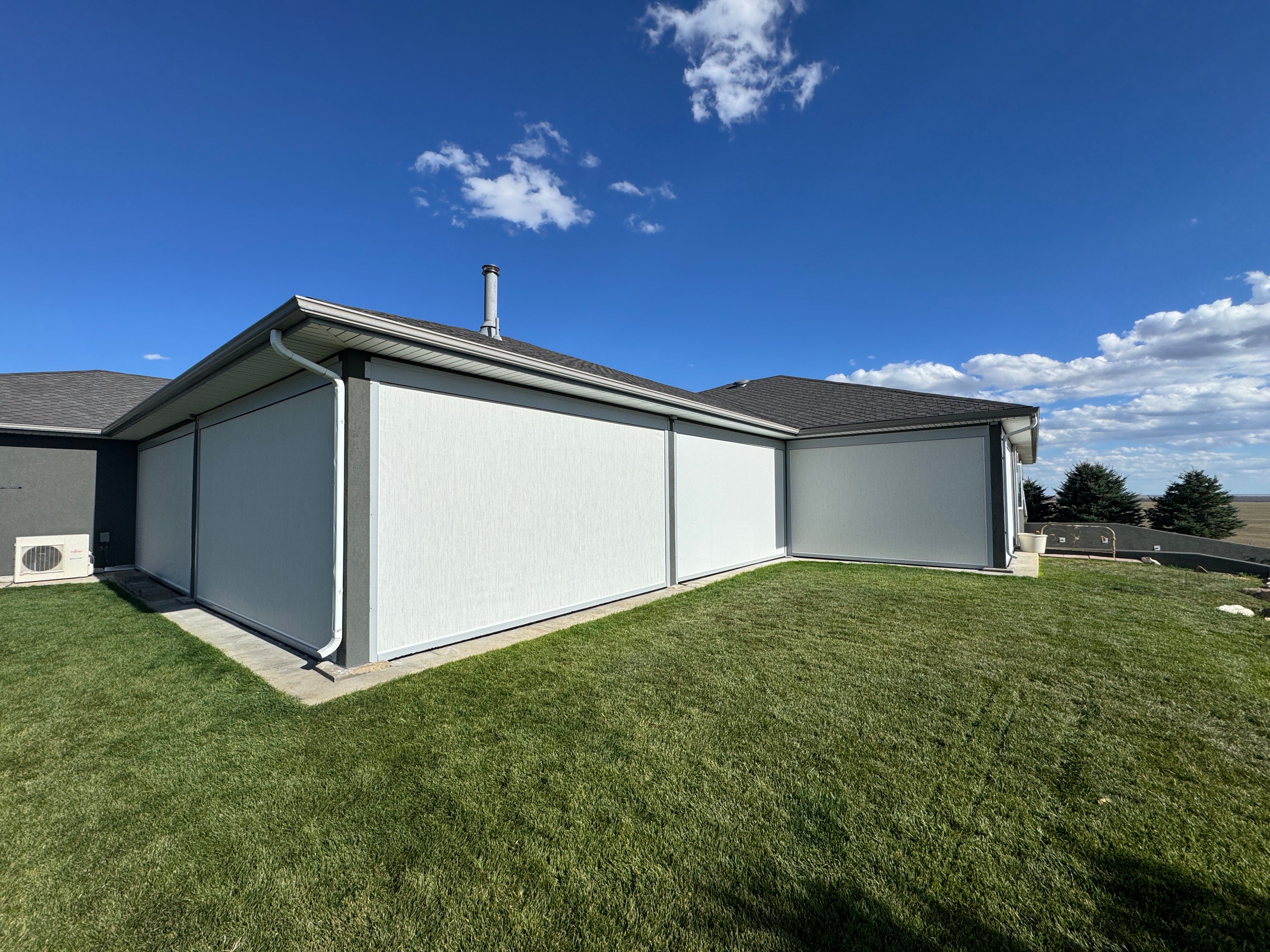 Exterior All-Weather MagnaTrack Screens Installation using Progressive MagnaTrack Screens by Outdoor Solutions Colorado