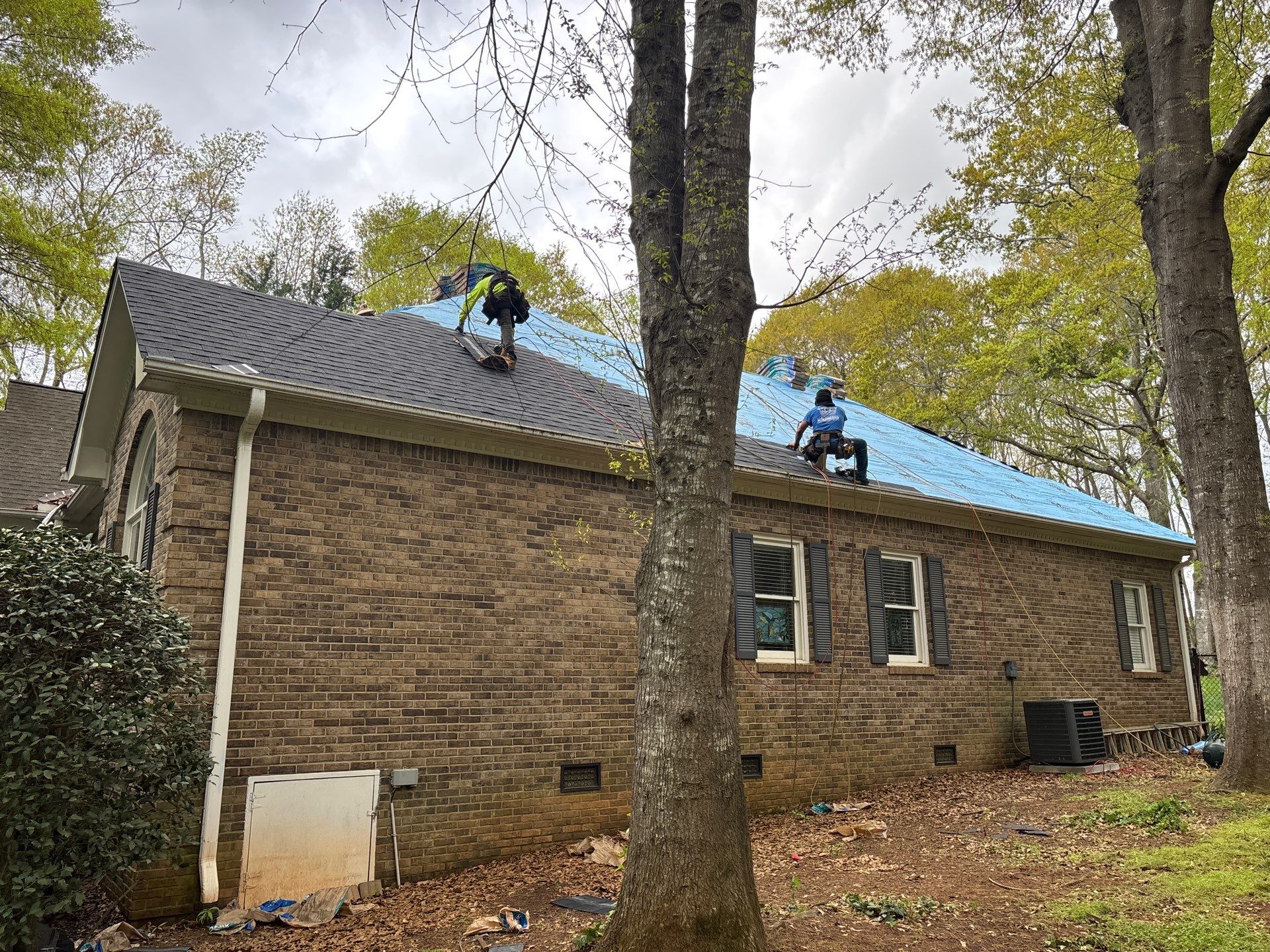 Spartanburg Residential Roof Replacement with Architectural Shingles and Skylights by Roofers LLC