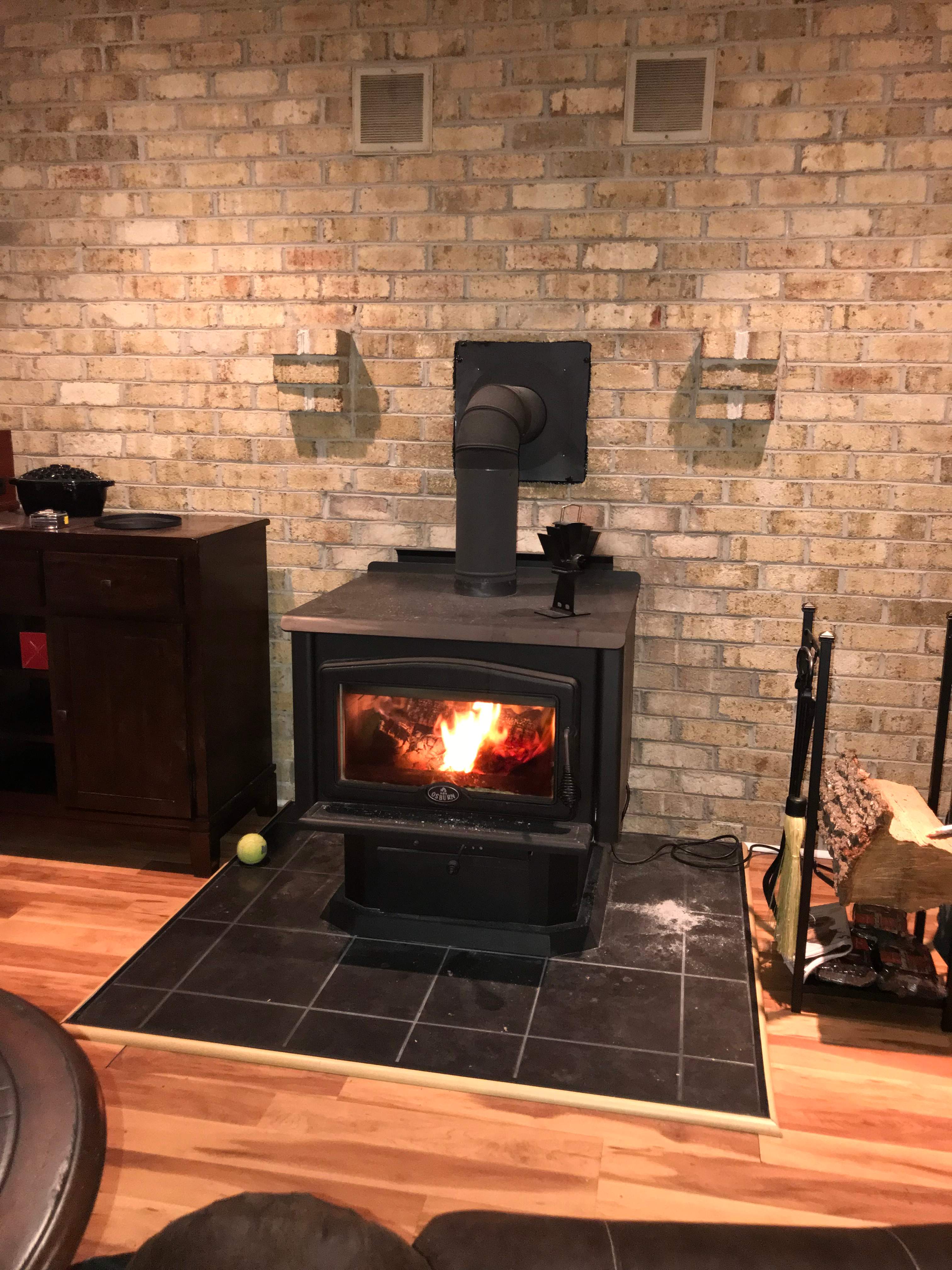 Freestanding Wood Stove Conversion by Premier Chimney and Roofing