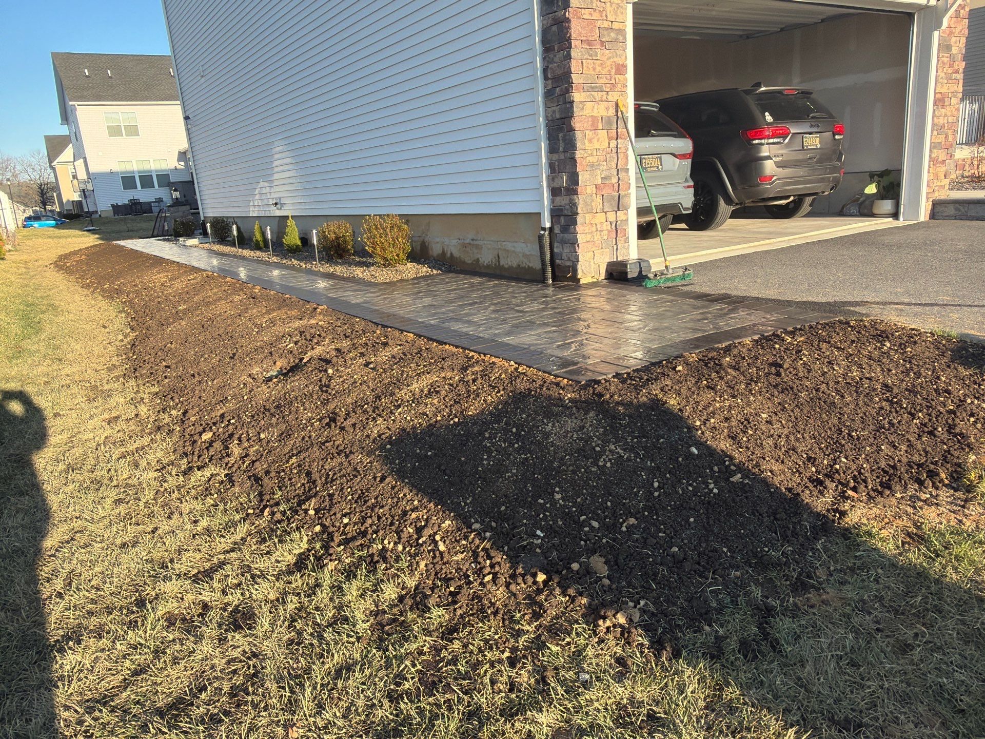 Custom Belgard Paver Patio Design & Installation in Delaware by Studio G Indoor Spaces & Outdoor Living