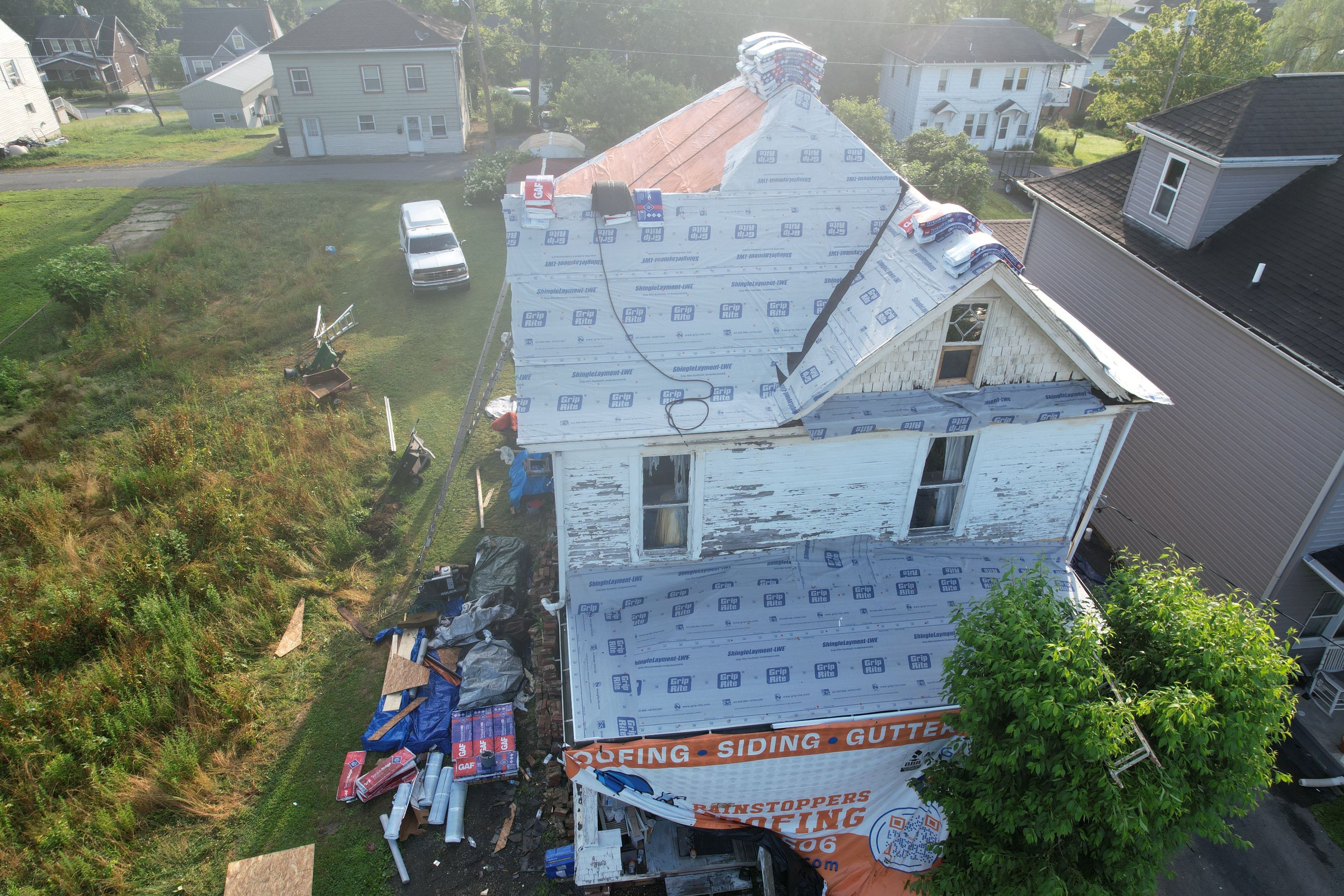Residential Roofing Installation using GAF Timberline HDZ Charcoal by Rainstoppers Roofing