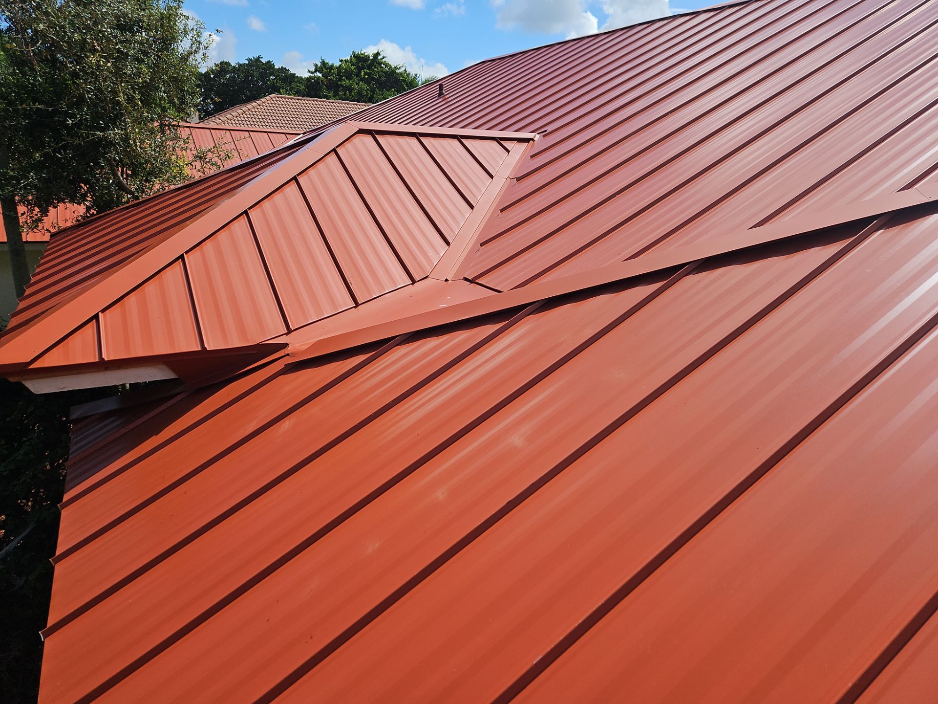 Residential Roofing Installation using 1" Nail strip metal roof by BLUES BROTHERS CONSTRUCTION CORP