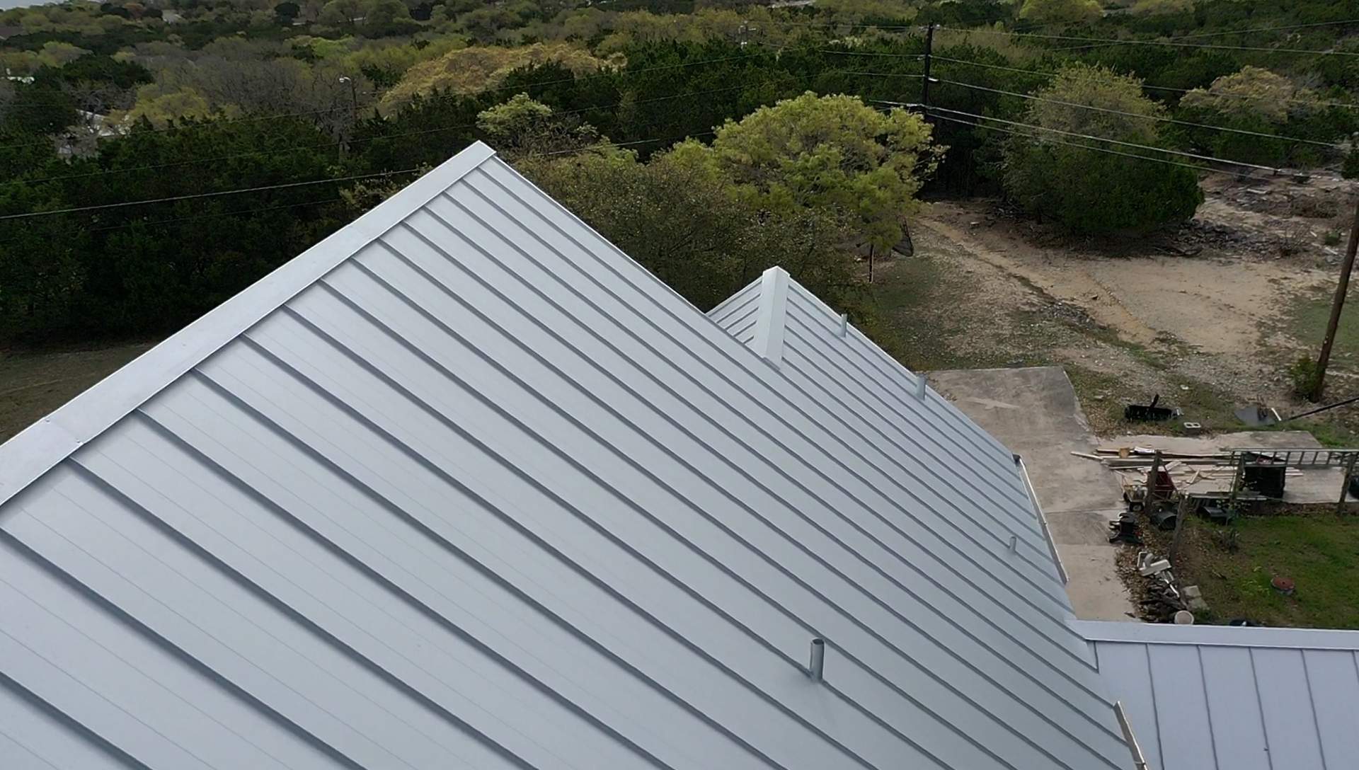 Residential Metal Roof Installation using McElroy Metal by Premier Roofing and Contracting