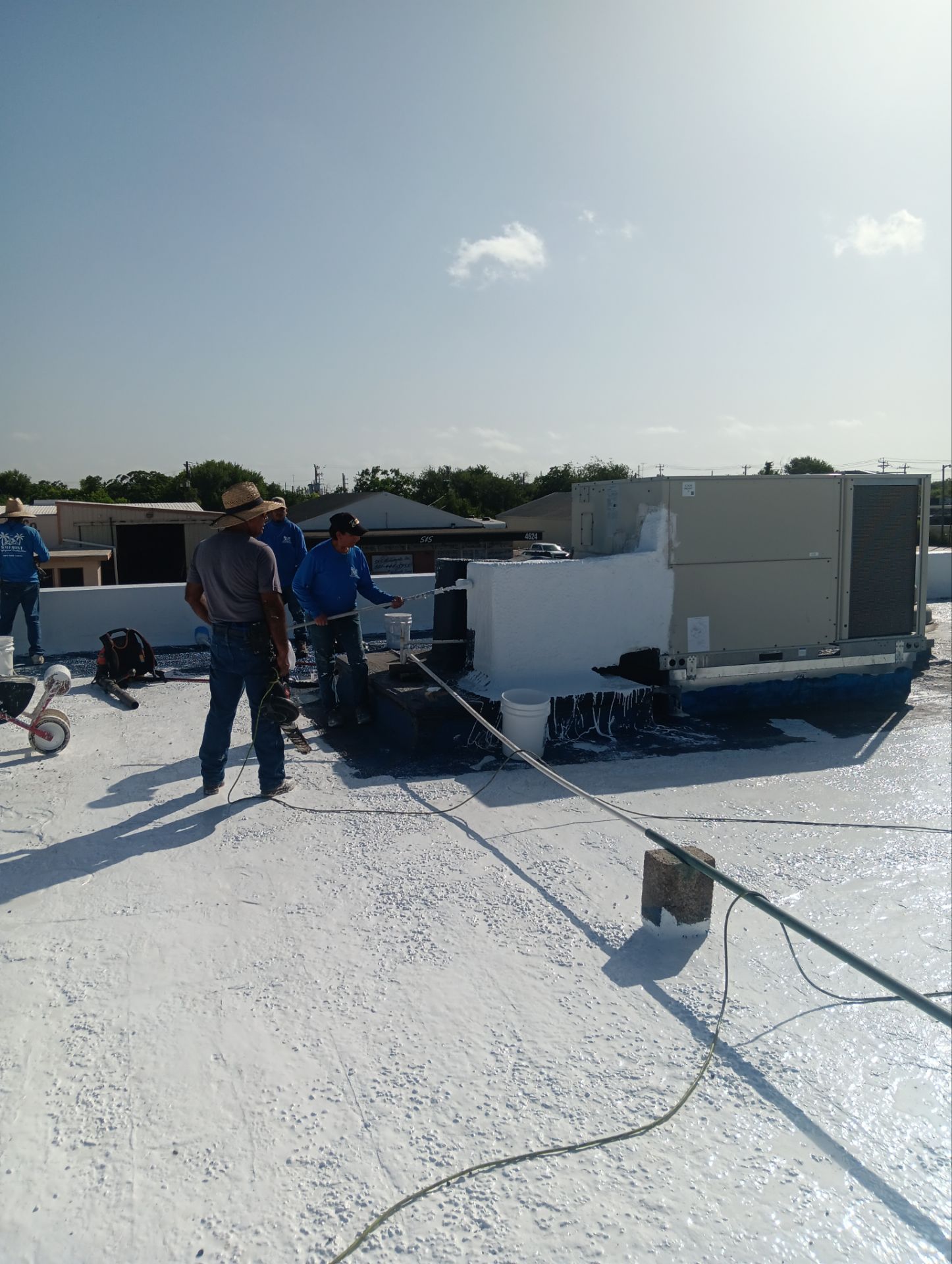 Dirty leaking Gravel Roof by Bayfront Roofing and Construction