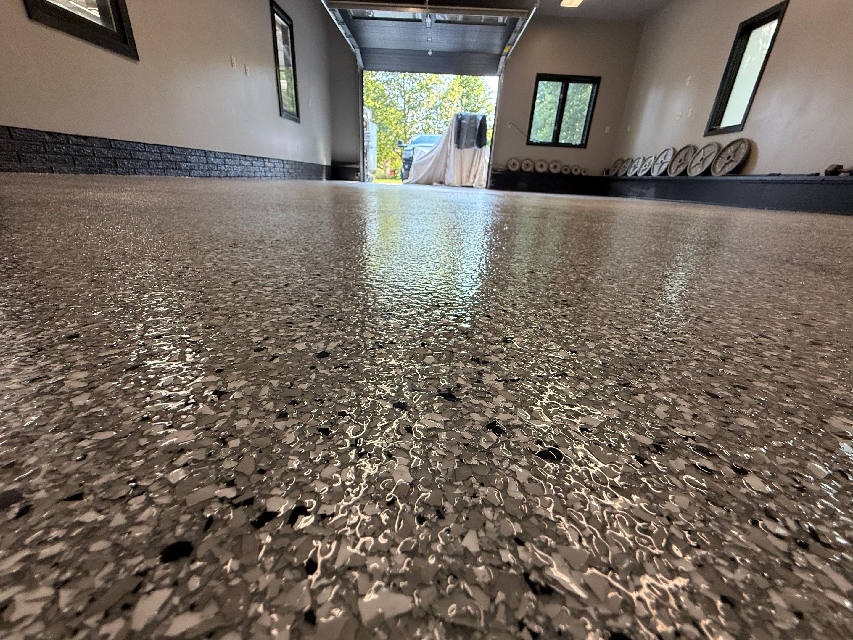 Garage Floor and Textured Pool Deck Coating in Sioux Falls by Select Painting, Coatings & Garage Cabinets