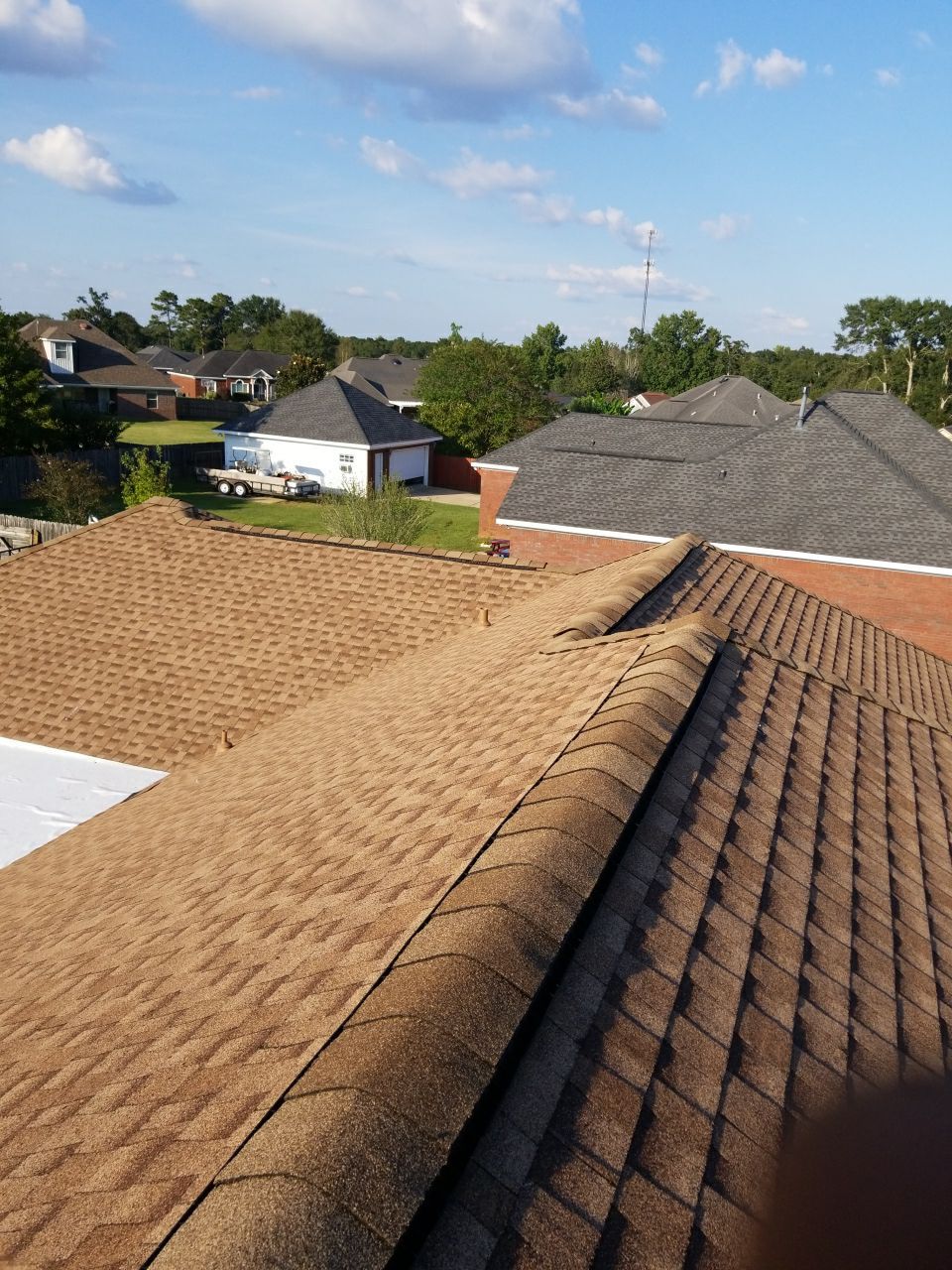 Residential Roofing Installation using Roof Replacement by American Roofing & Construction LLC