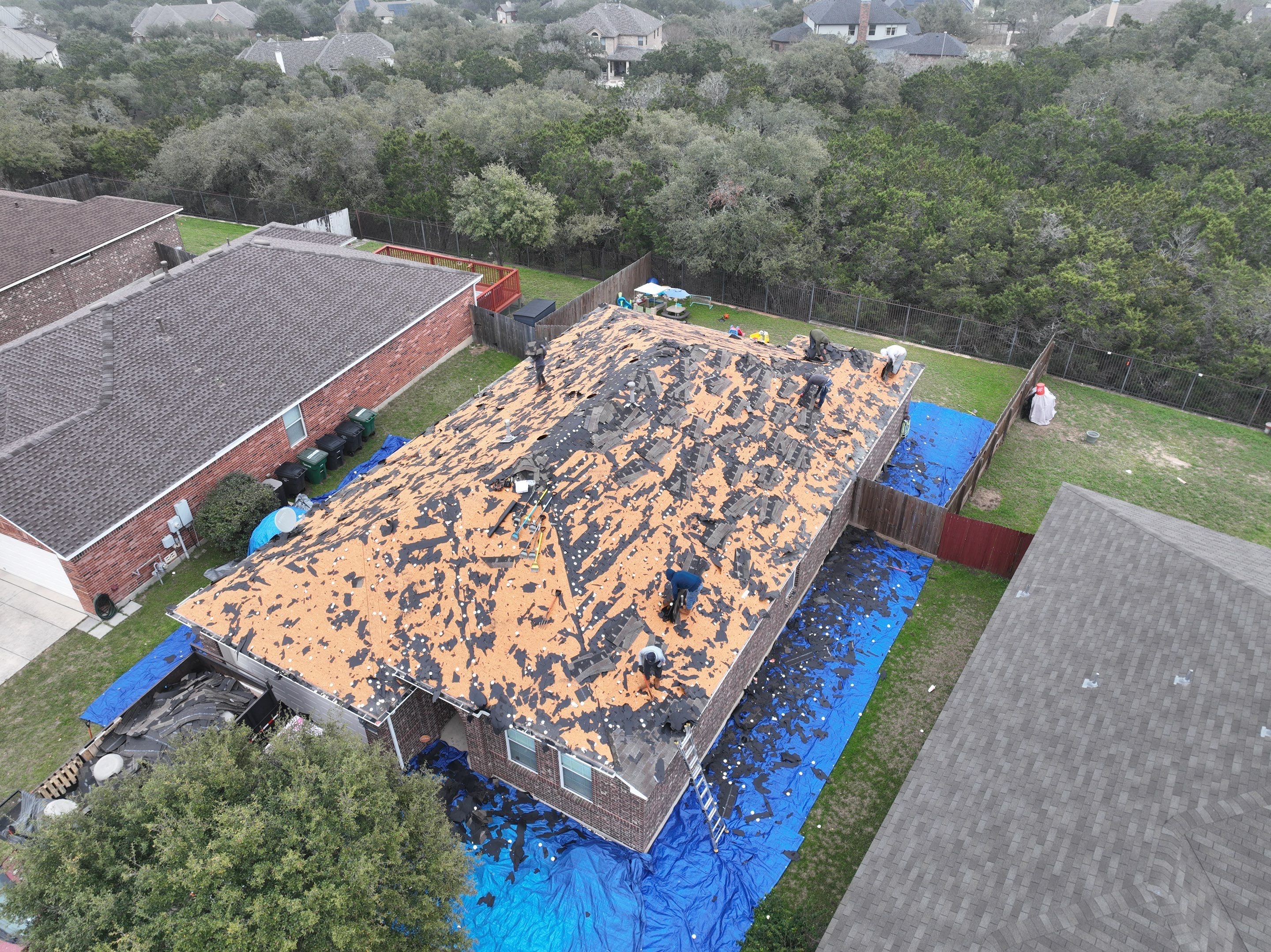 Residential Roof Replacement using 30 Year Laminate Shingles with High Profile Ridge by Premier Roofing and Contracting