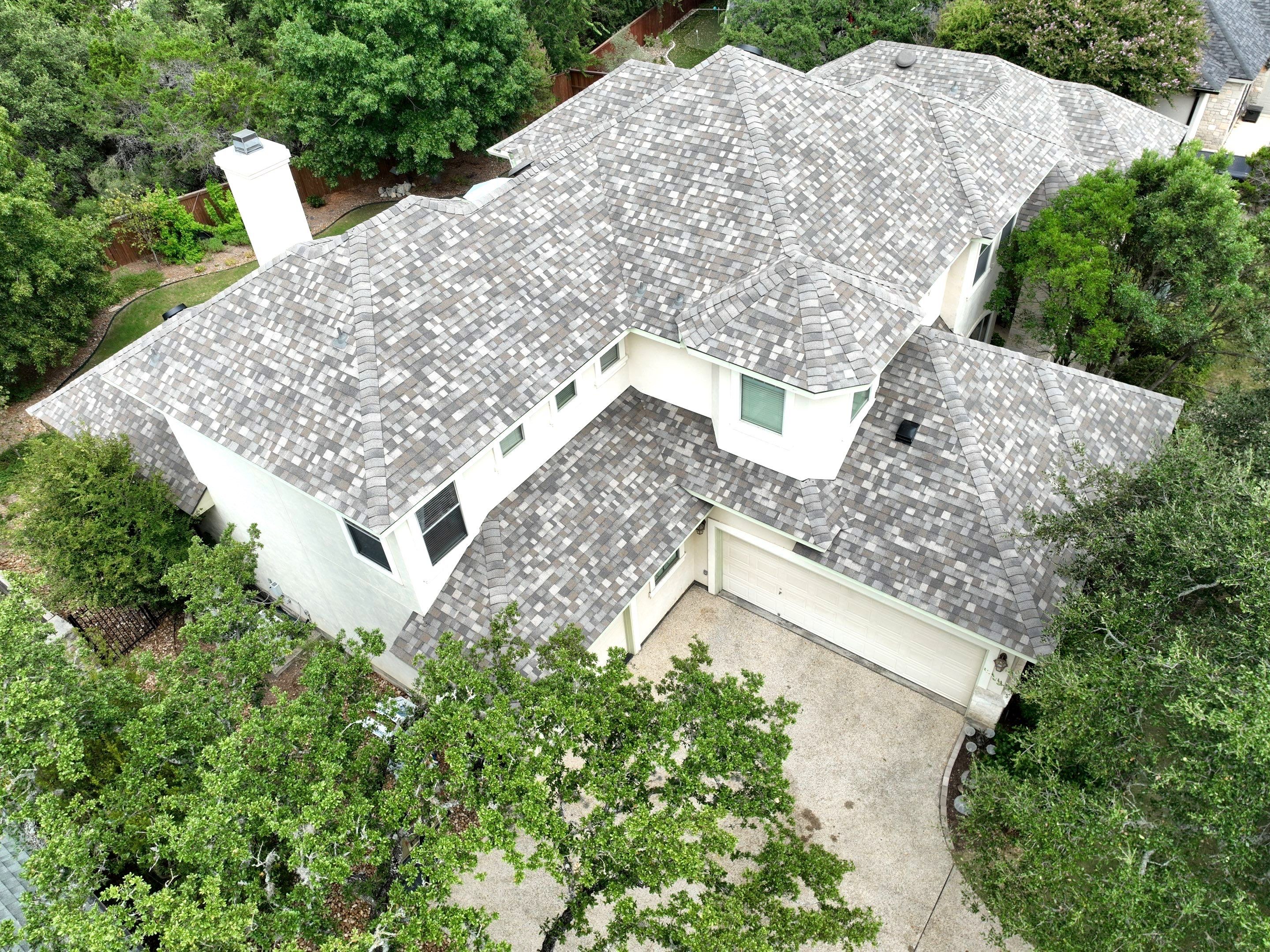 Residential Roof Replacement using 30 Year Laminate Shingles with High Profile Ridge by Premier Roofing and Contracting